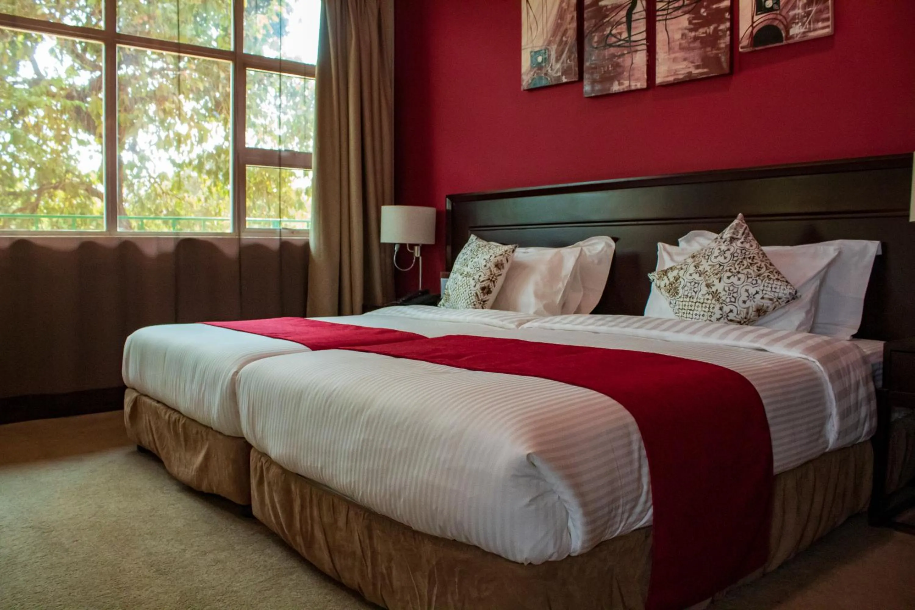 Bed in MalVille Boutique Hotel