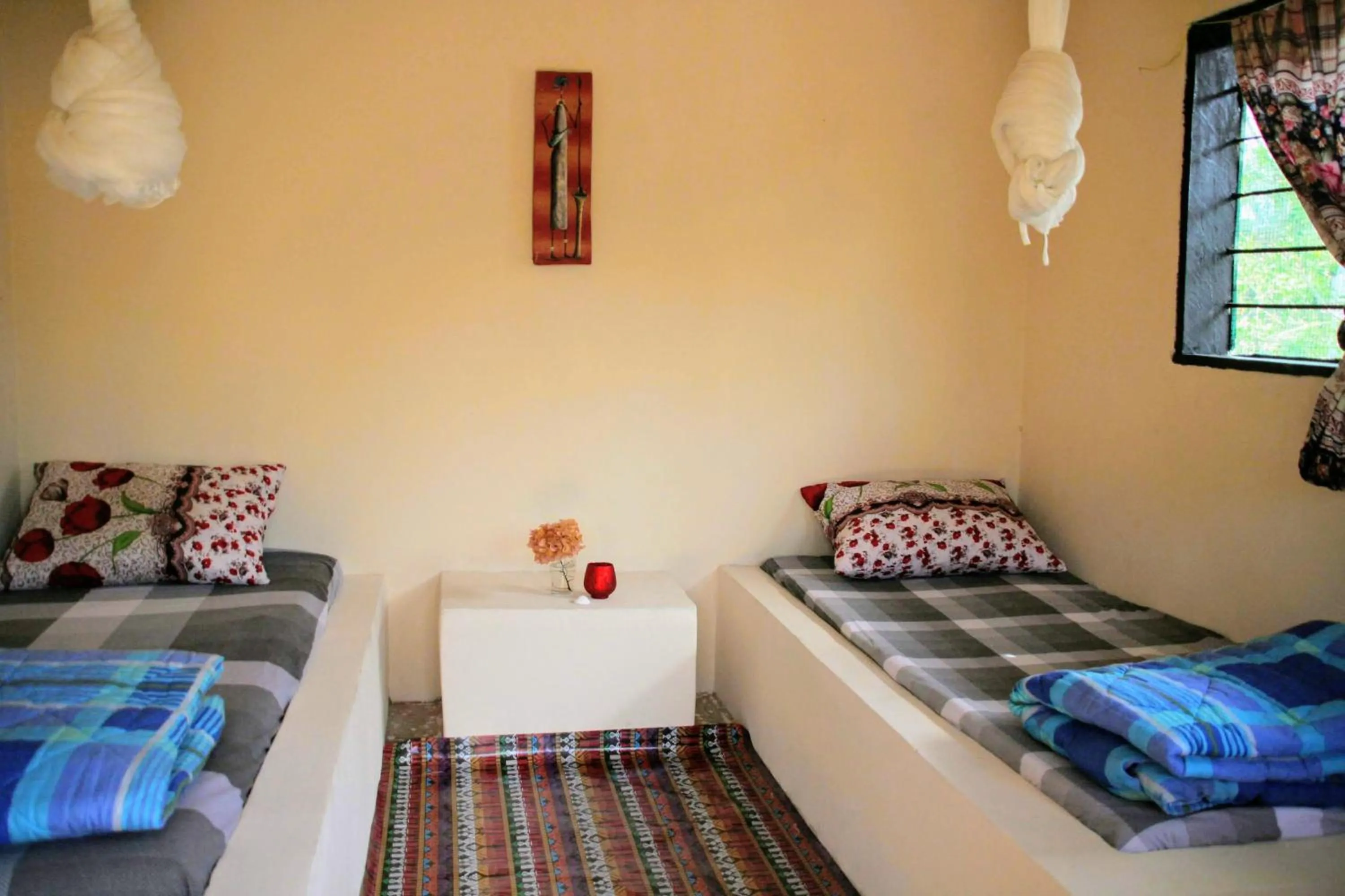 Bed in Tamba Kuruba Eco-lodge