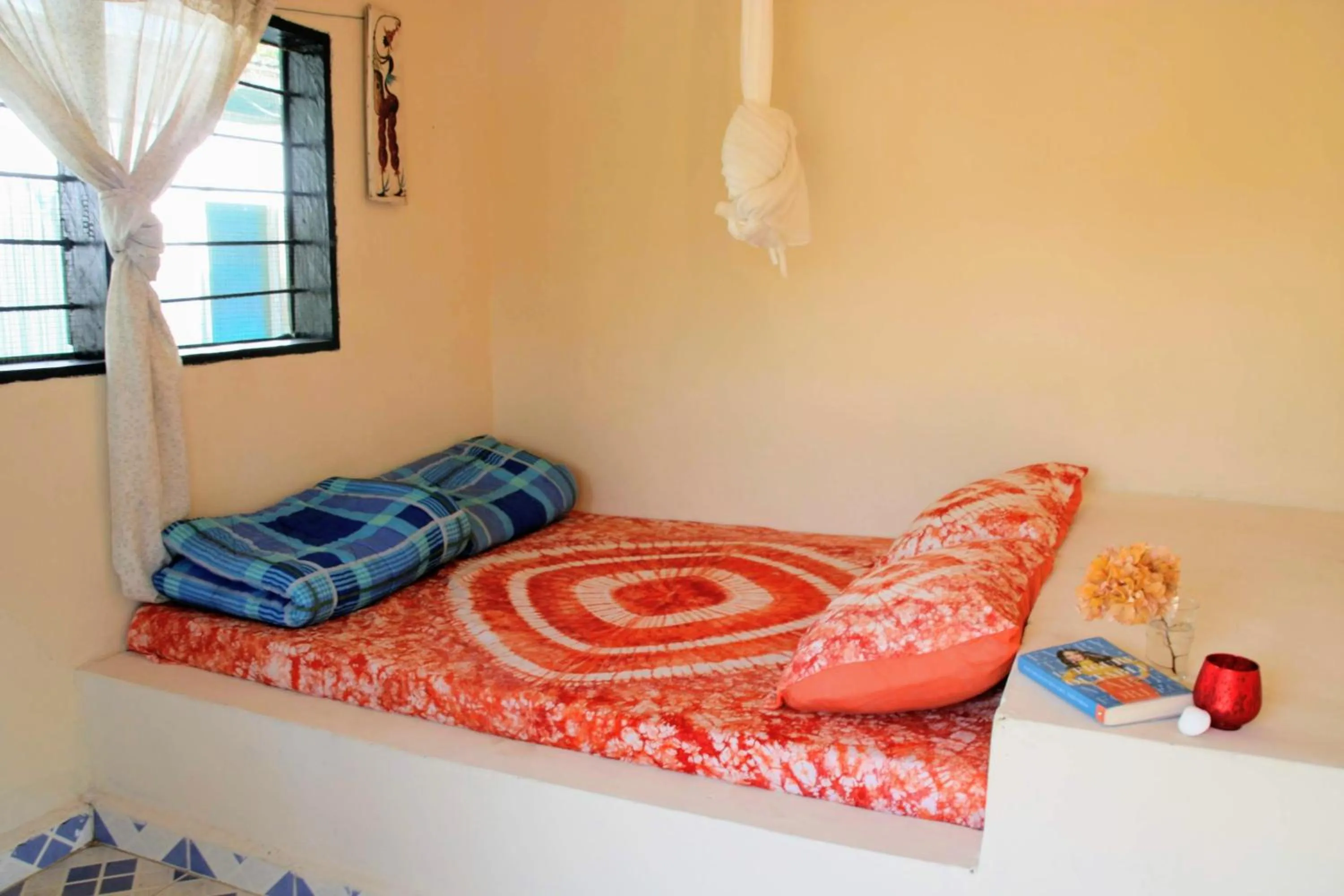 Bed in Tamba Kuruba Eco-lodge