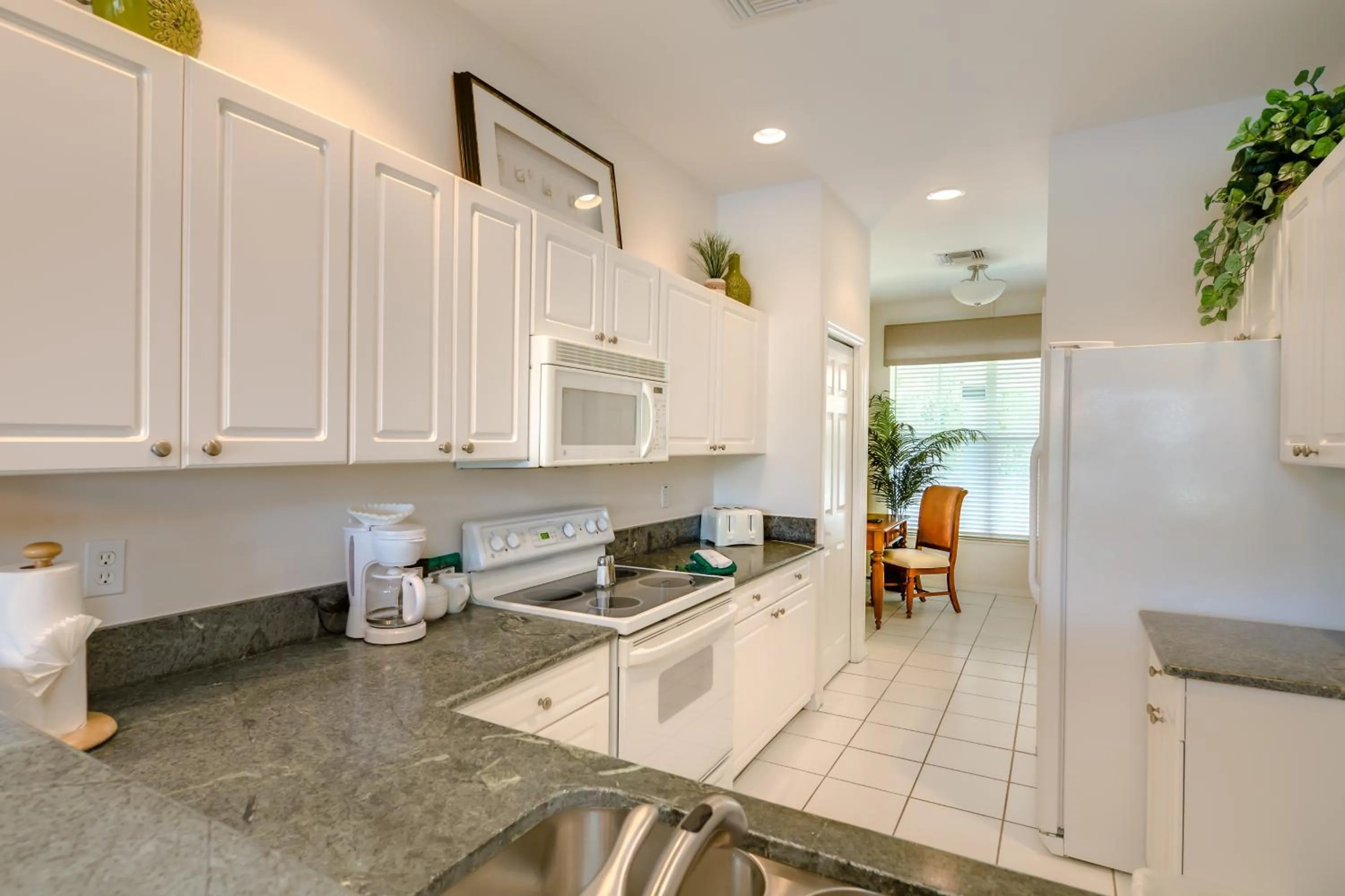 Kitchen or kitchenette in GreenLinks Golf Villas at Lely Resort