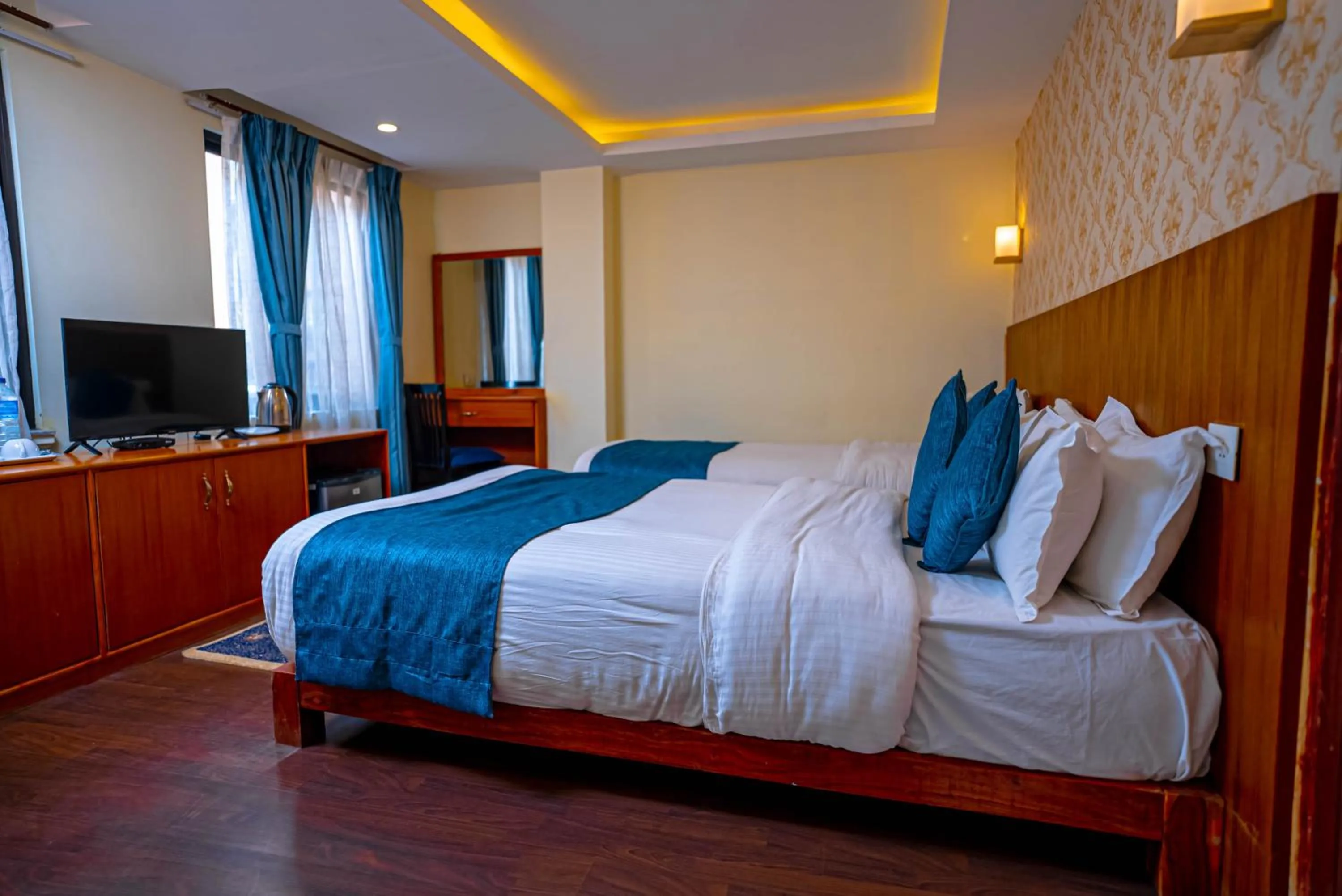 Bedroom in Satkar Hotel and Spa