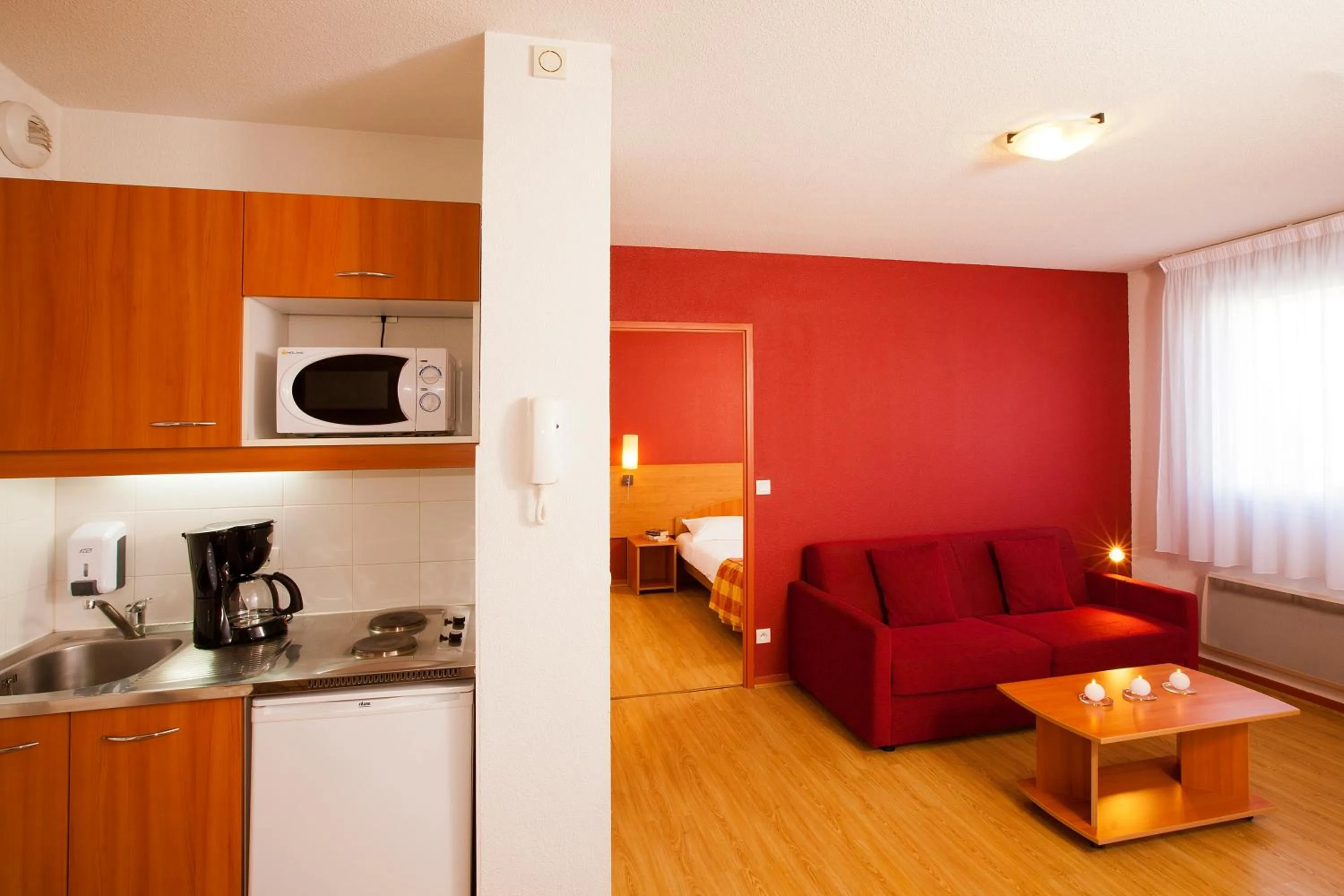 Kitchen or kitchenette in Séjours & Affaires Genève Saint Genis