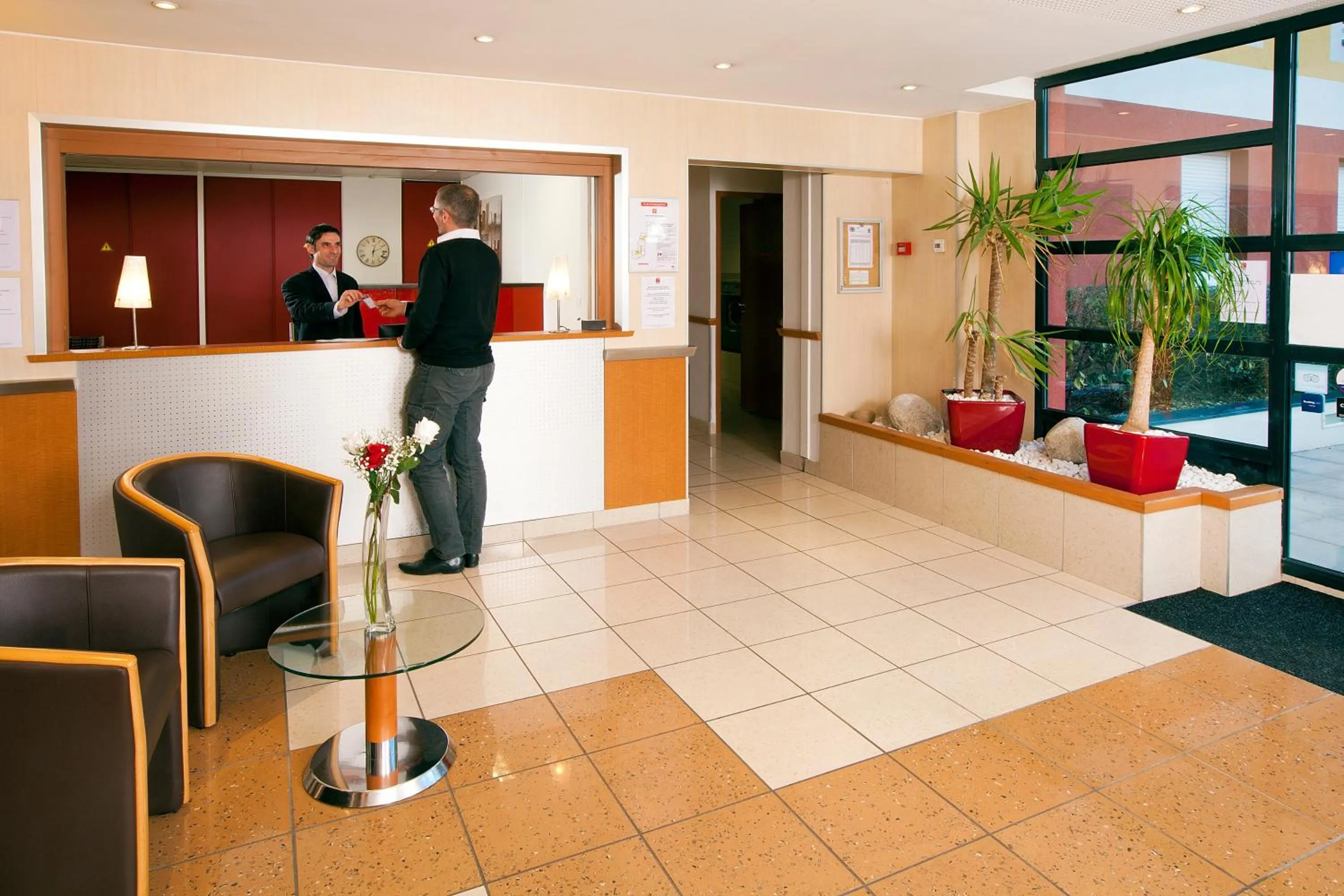 Lobby or reception in Séjours & Affaires Genève Saint Genis