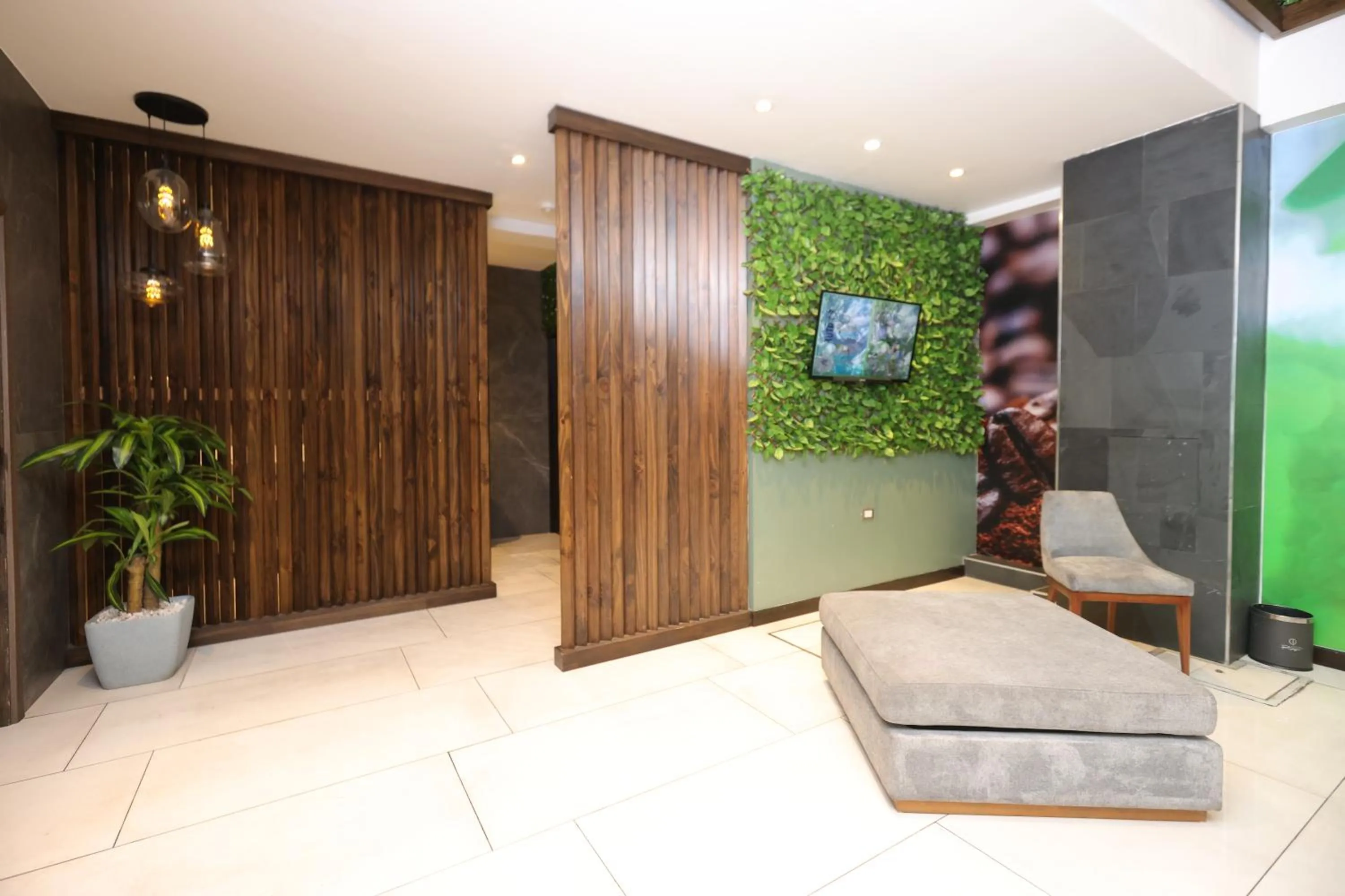 Communal lounge/ TV room in Hotel Cultura Plaza