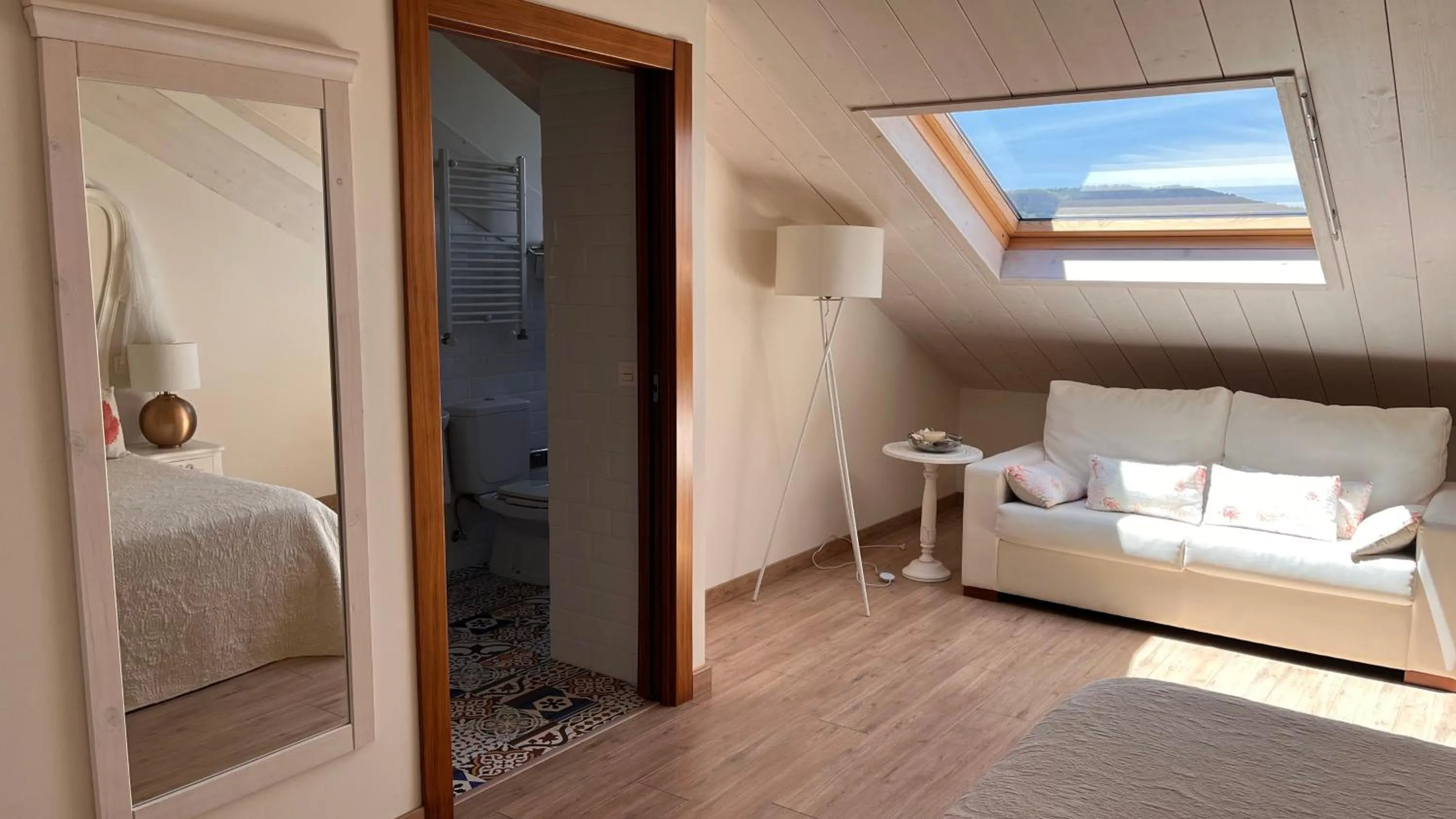 Living room, Bed in Hotel Rural Playa de Aguilar