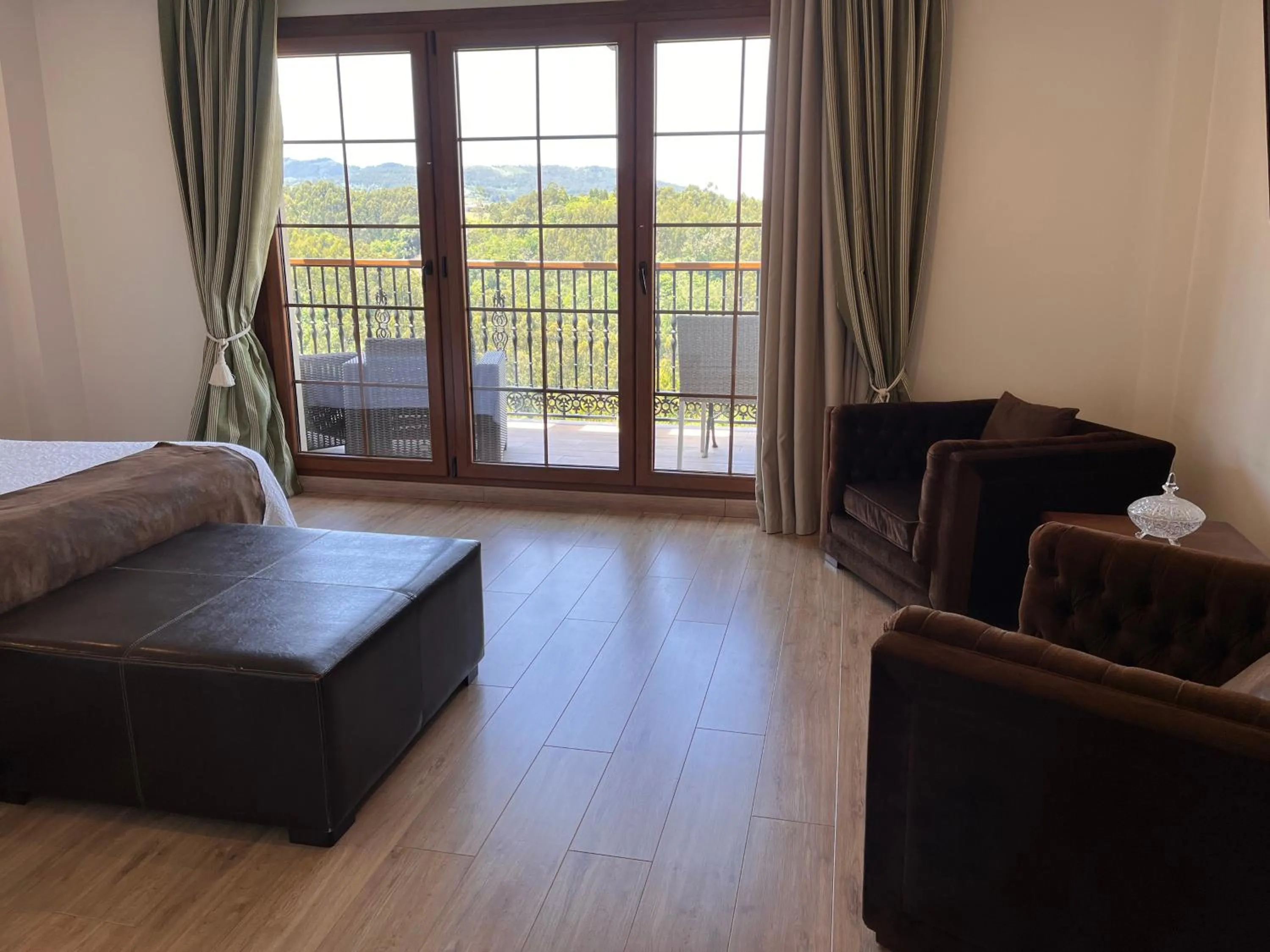 Living room, Bed in Hotel Rural Playa de Aguilar
