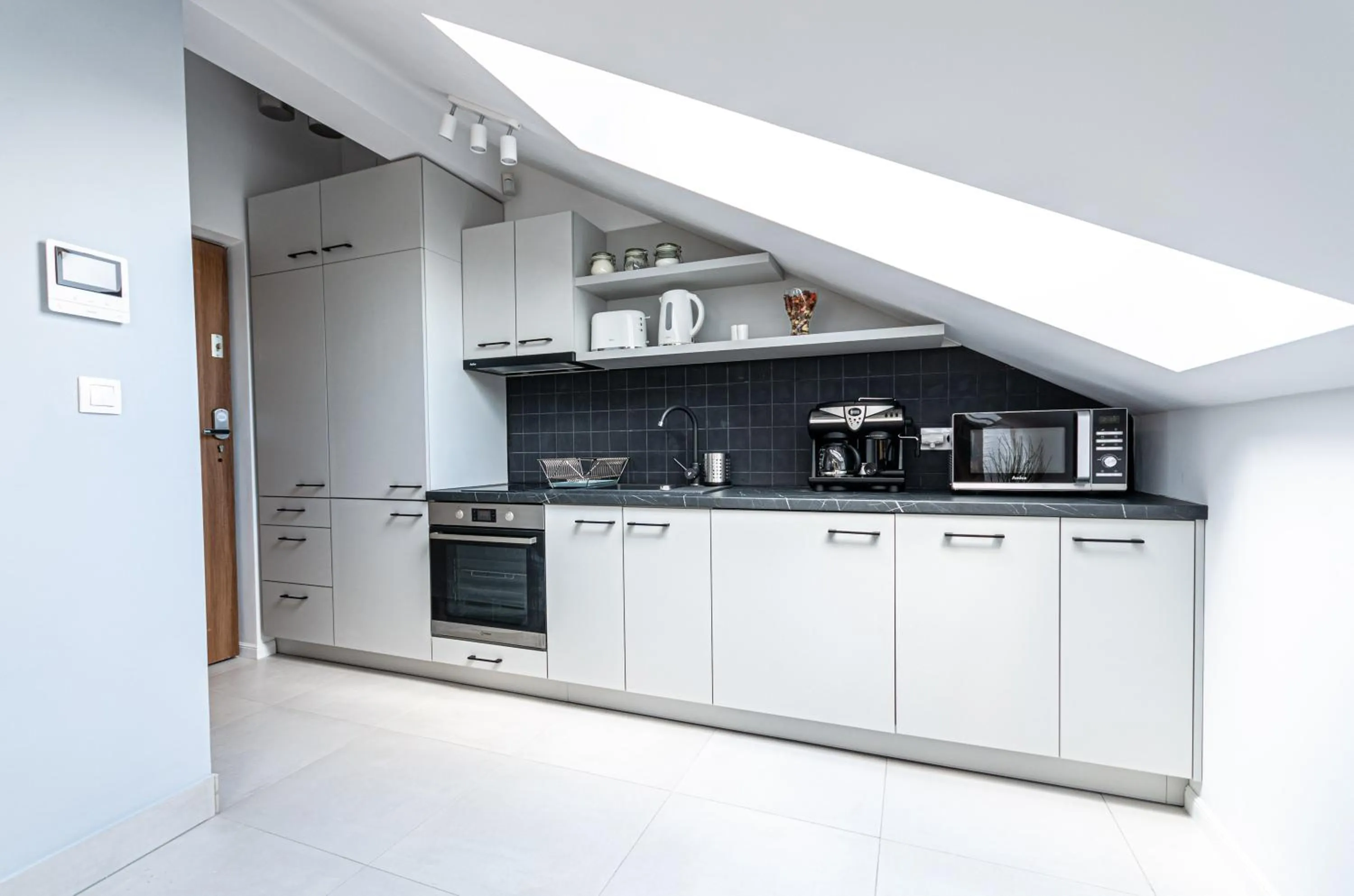 Kitchen or kitchenette in Old Town Vistula Premium Apartments