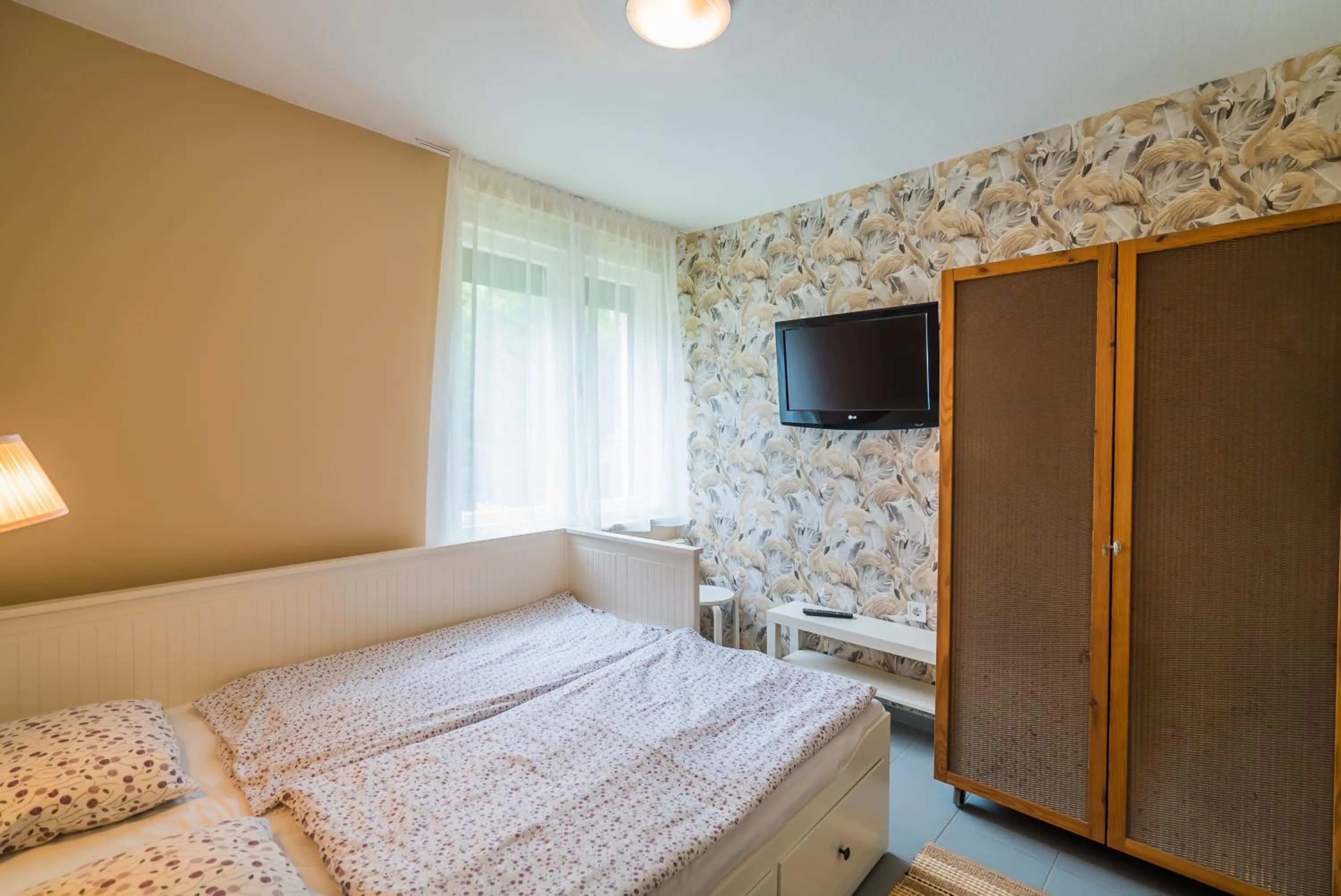 Bed in Villa Mária Vendégház