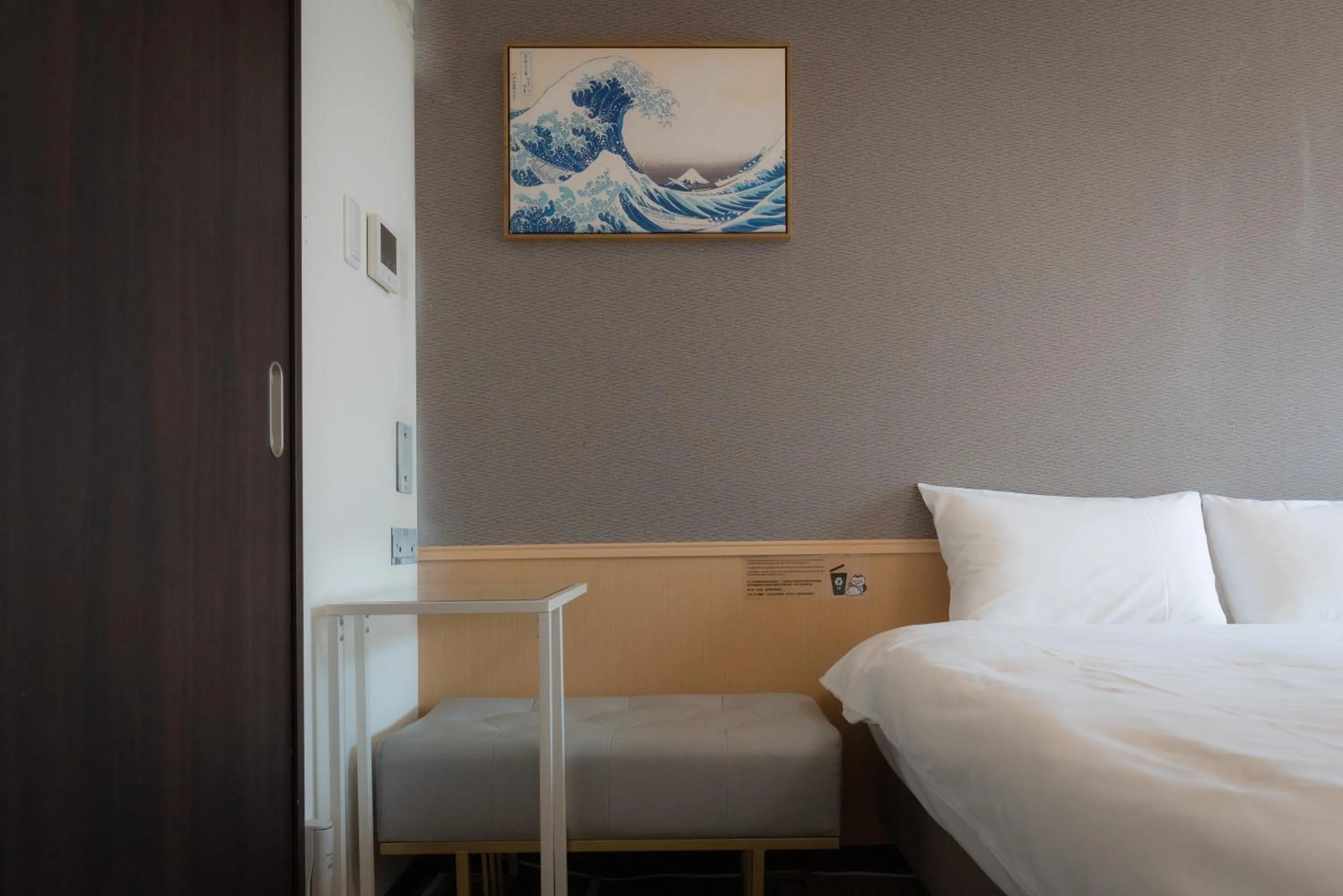 Bed in INA HOUSE Nijojo