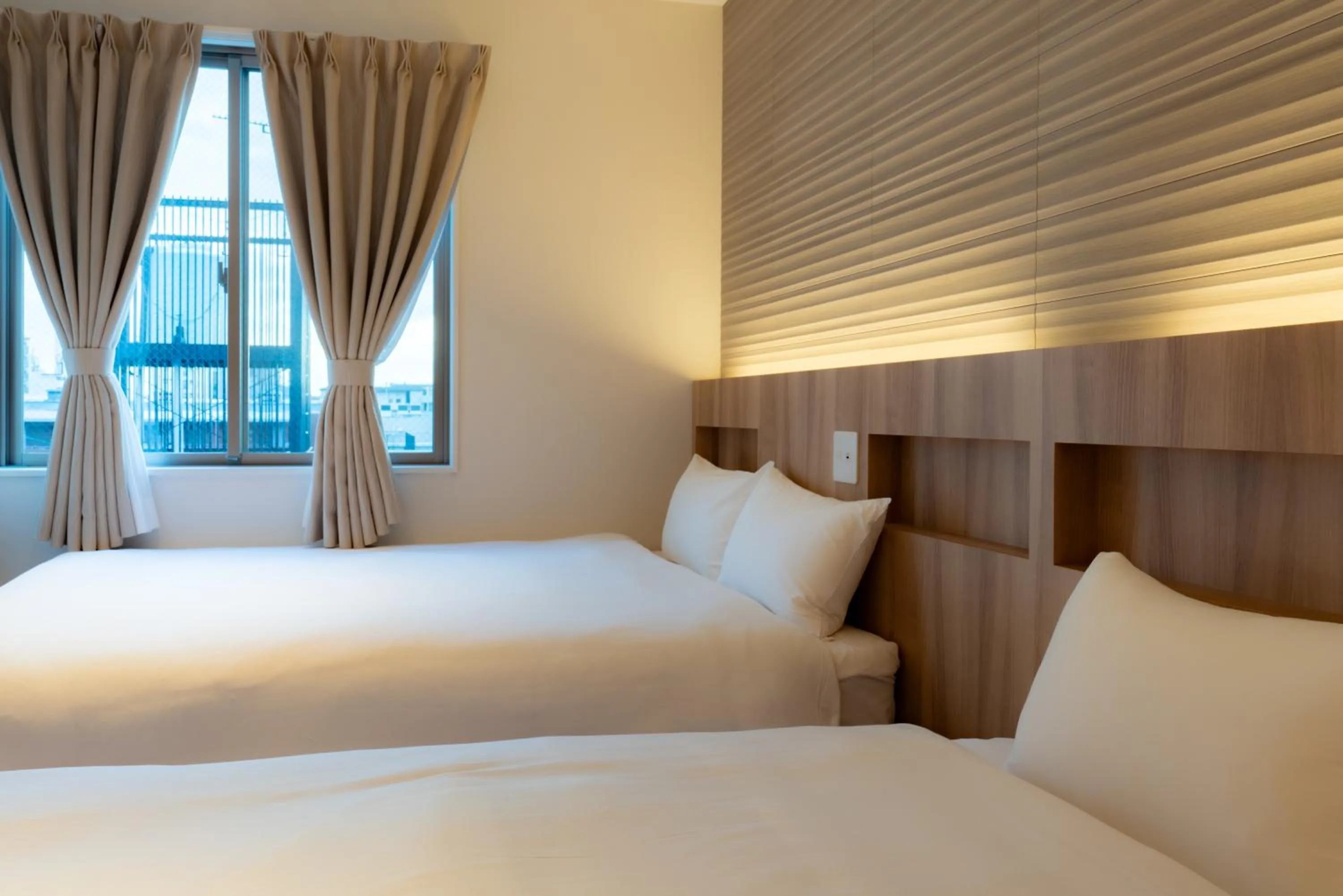 Bed in INA HOUSE Nijojo