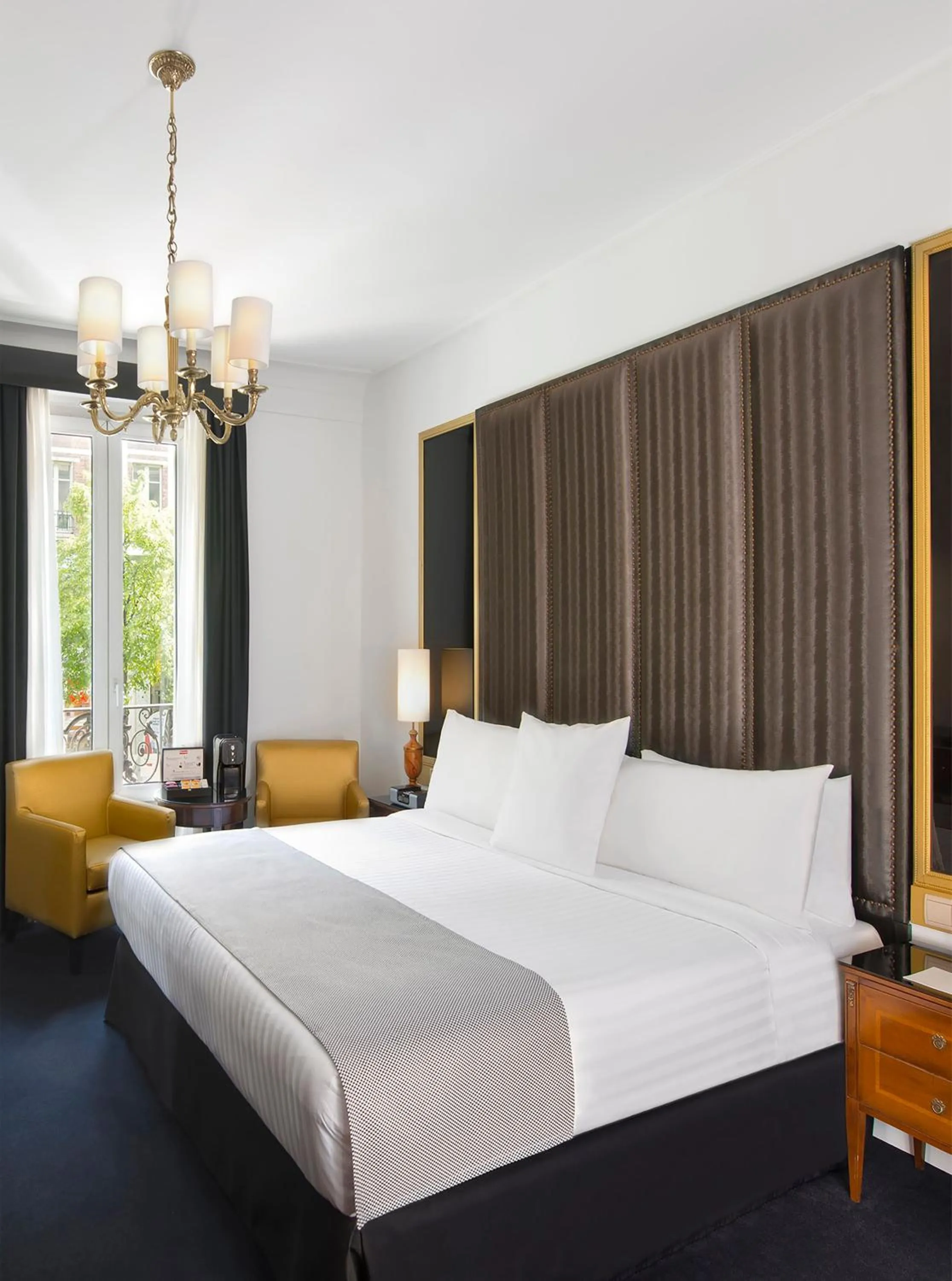 Bed in Meliá Paris Champs Elysées