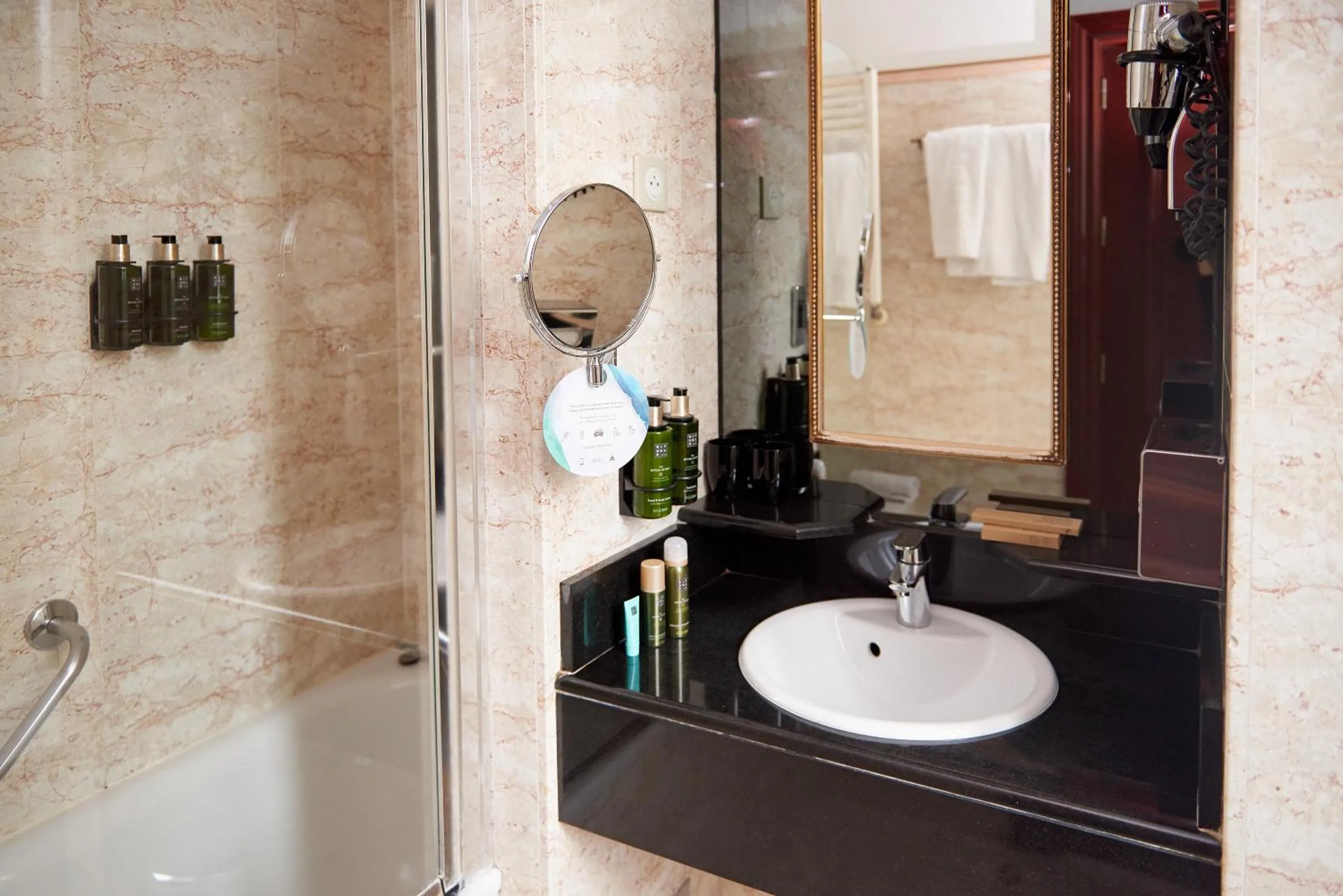 Bathroom in Melia Paris Champs Elysées