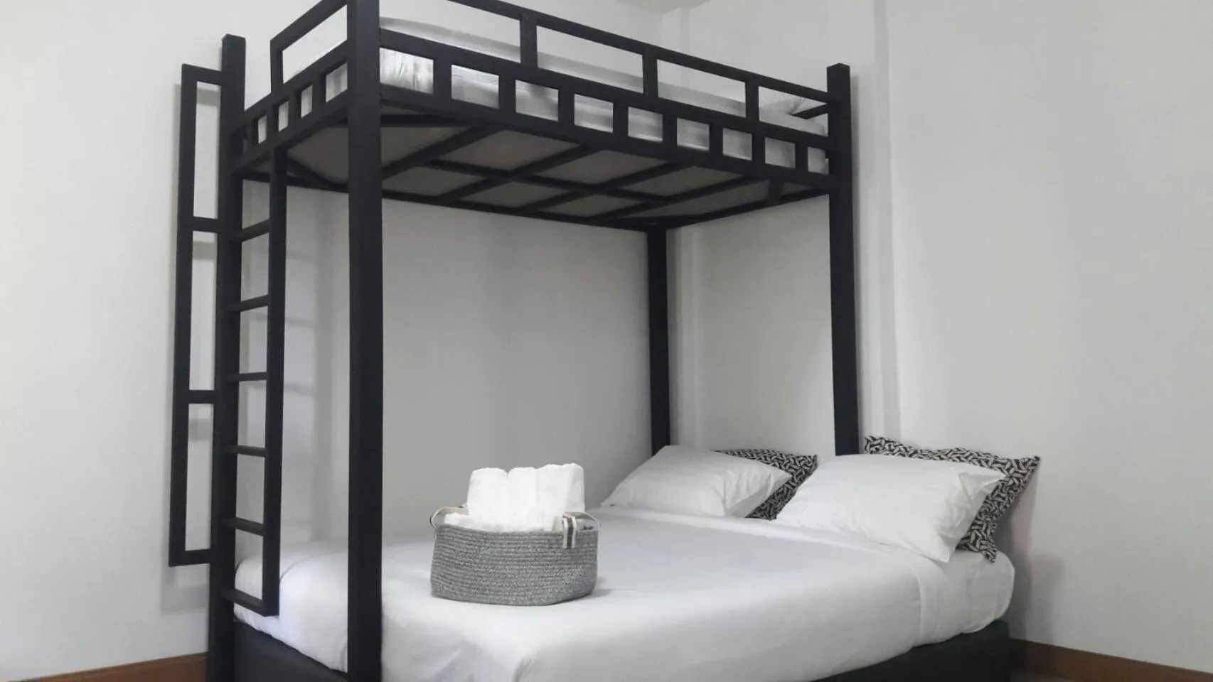 Bed in CoZyHouseChiangrai
