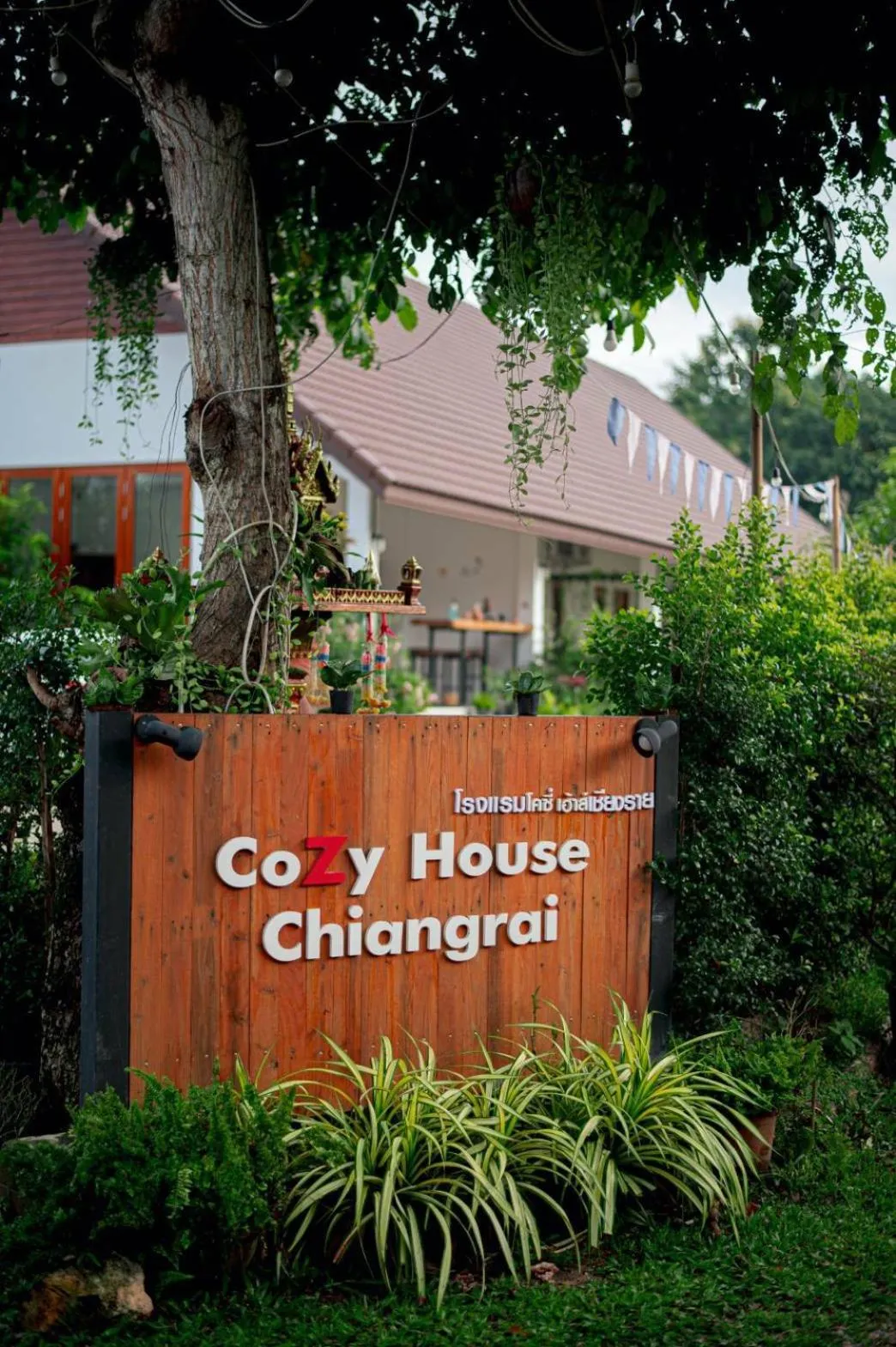 Property logo or sign in CoZyHouseChiangrai