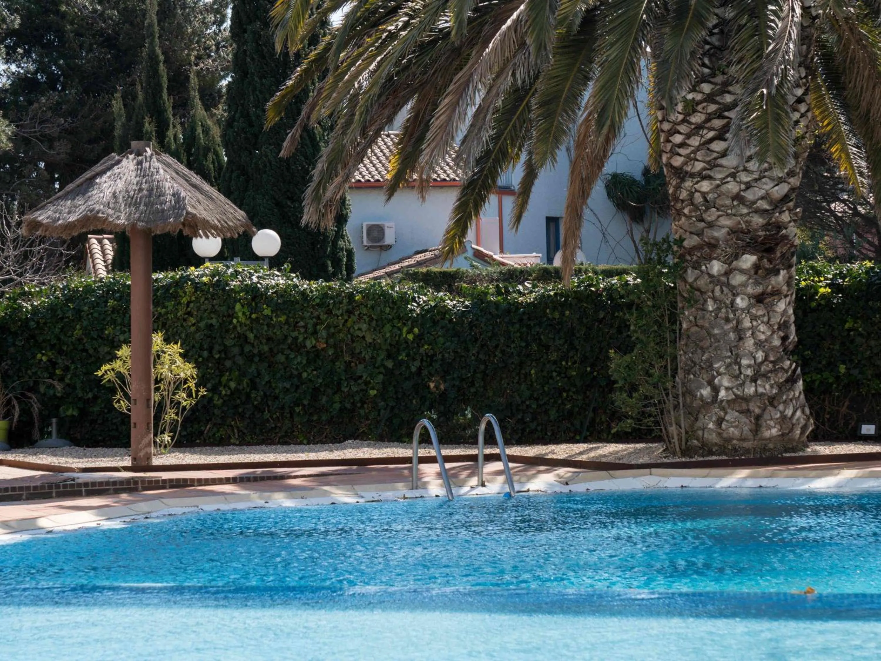 Pool view in ibis Styles Perpignan Canet En Roussillon