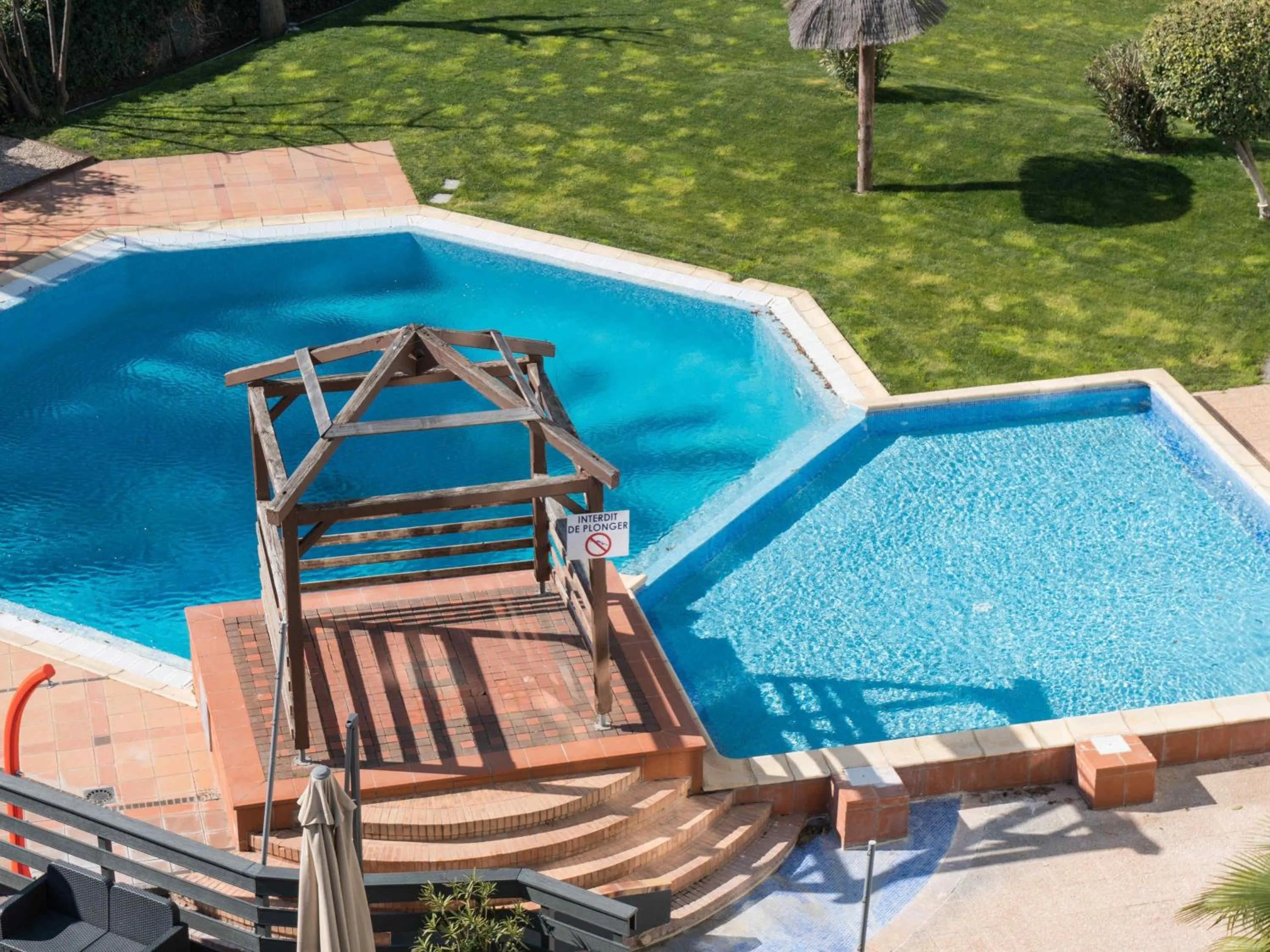 Pool view in ibis Styles Perpignan Canet En Roussillon