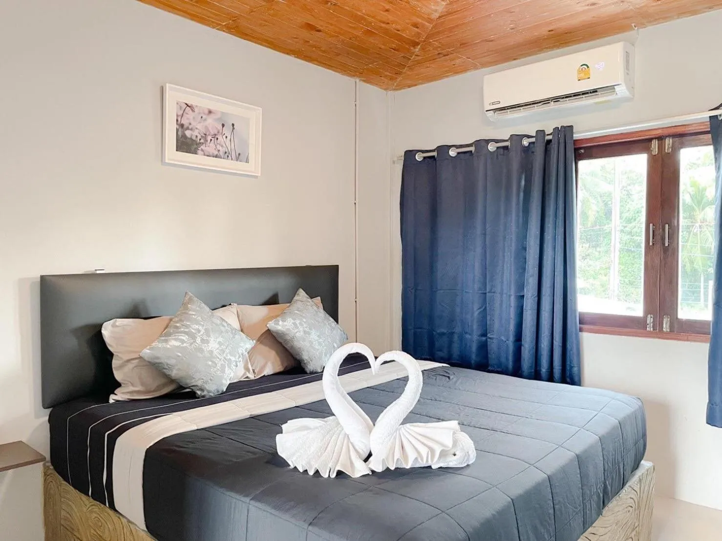 Photo of the whole room, Bed in MOOK BOONCHU HOTEL