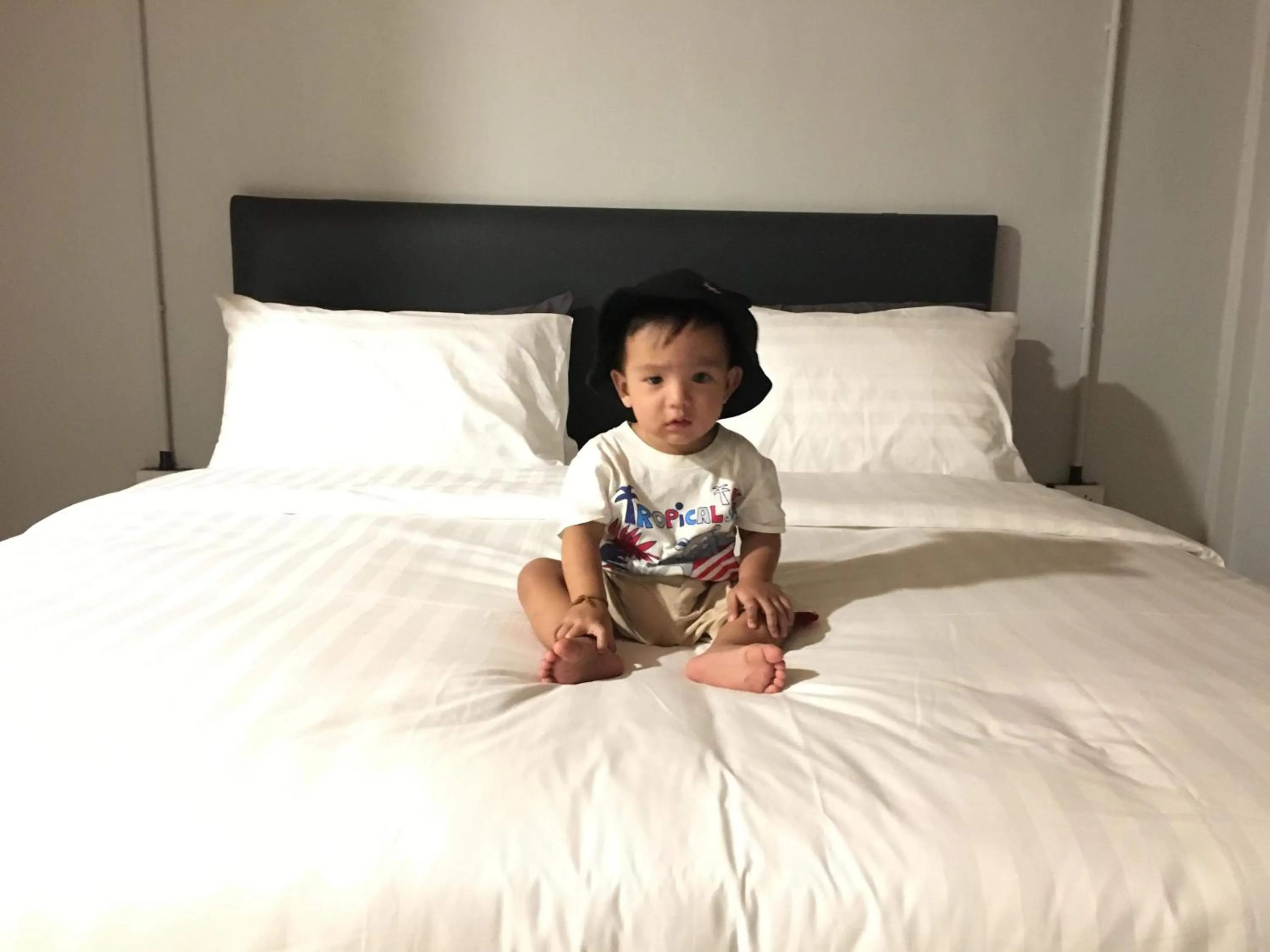 Bed in MOOK BOONCHU HOTEL