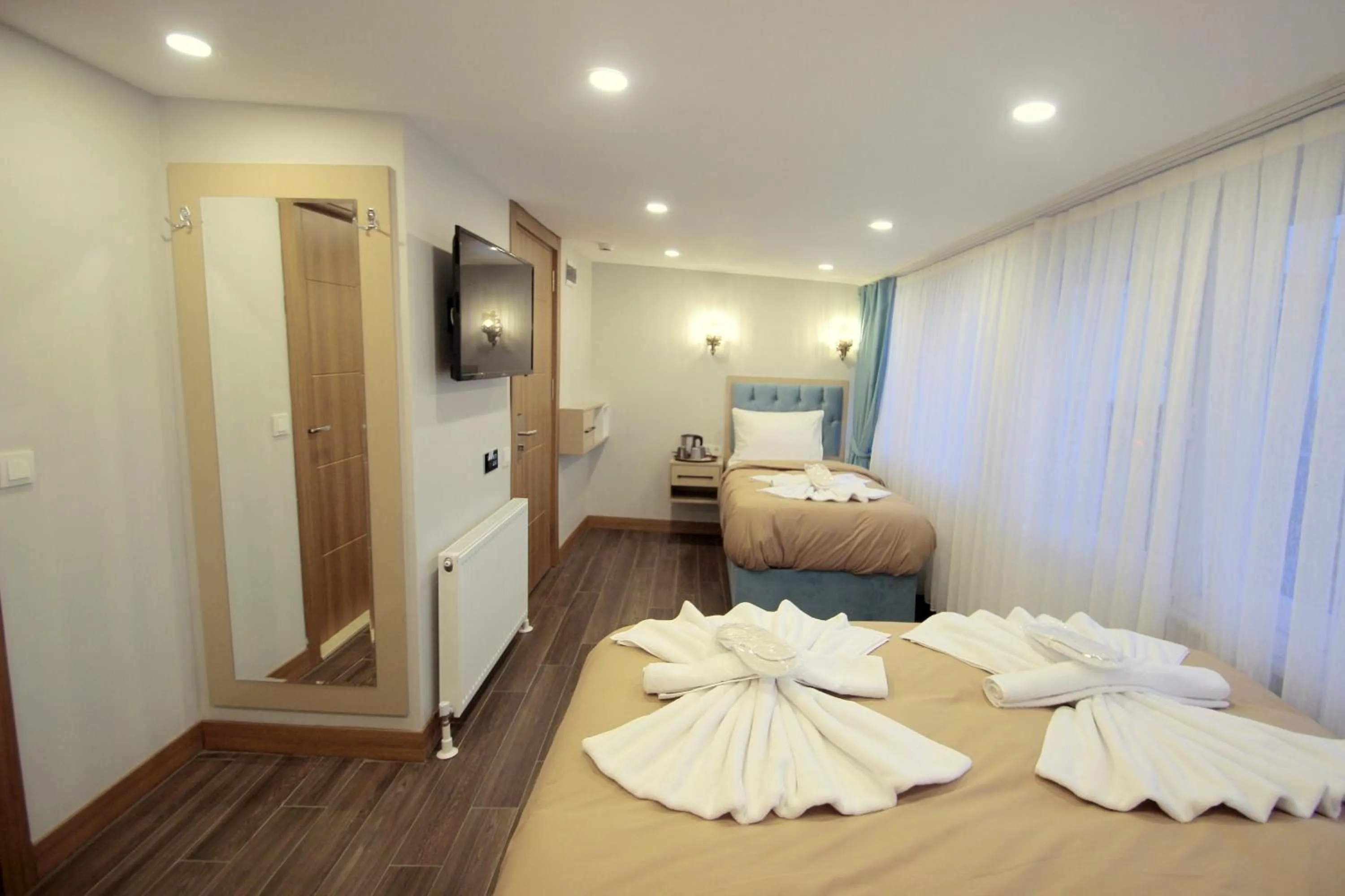 Photo of the whole room, Bed in Hira Hotel