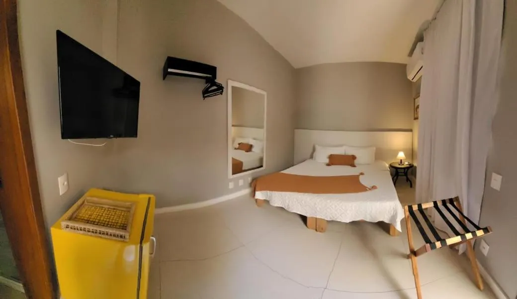 Bed in POUSADA DA NANA