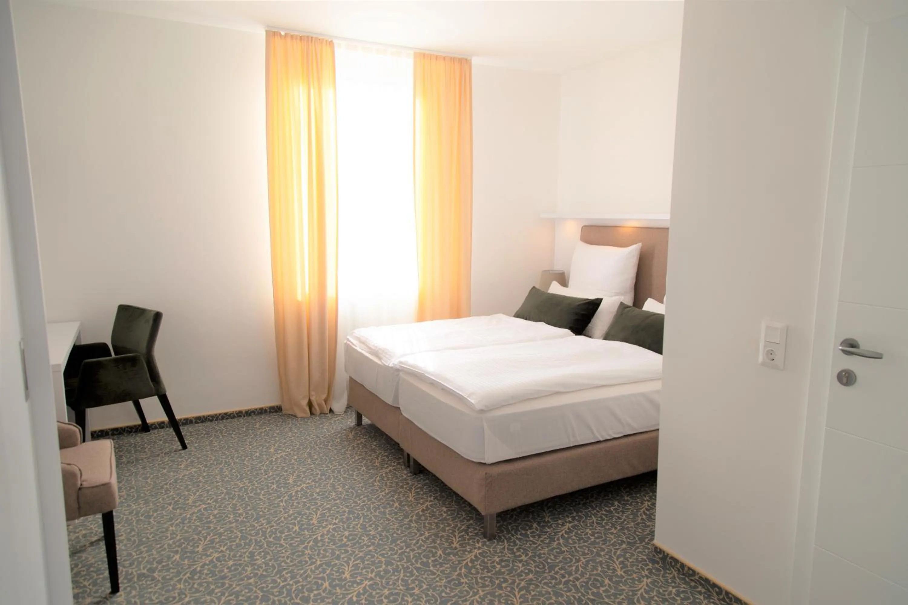 Bed in Amplidi Hotel Hannover