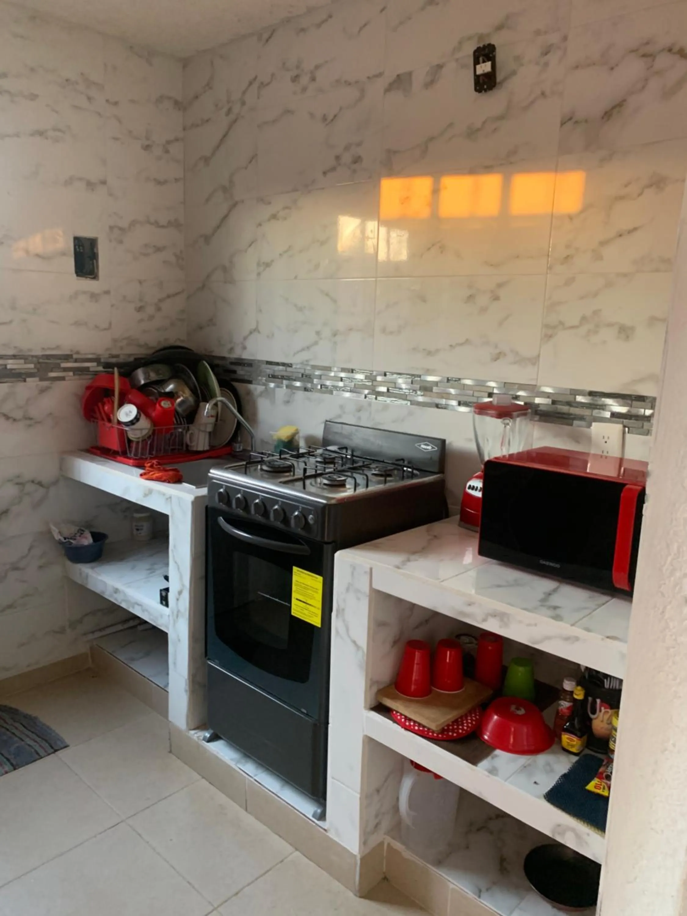 Kitchen or kitchenette in sweet home ixtapa comfort