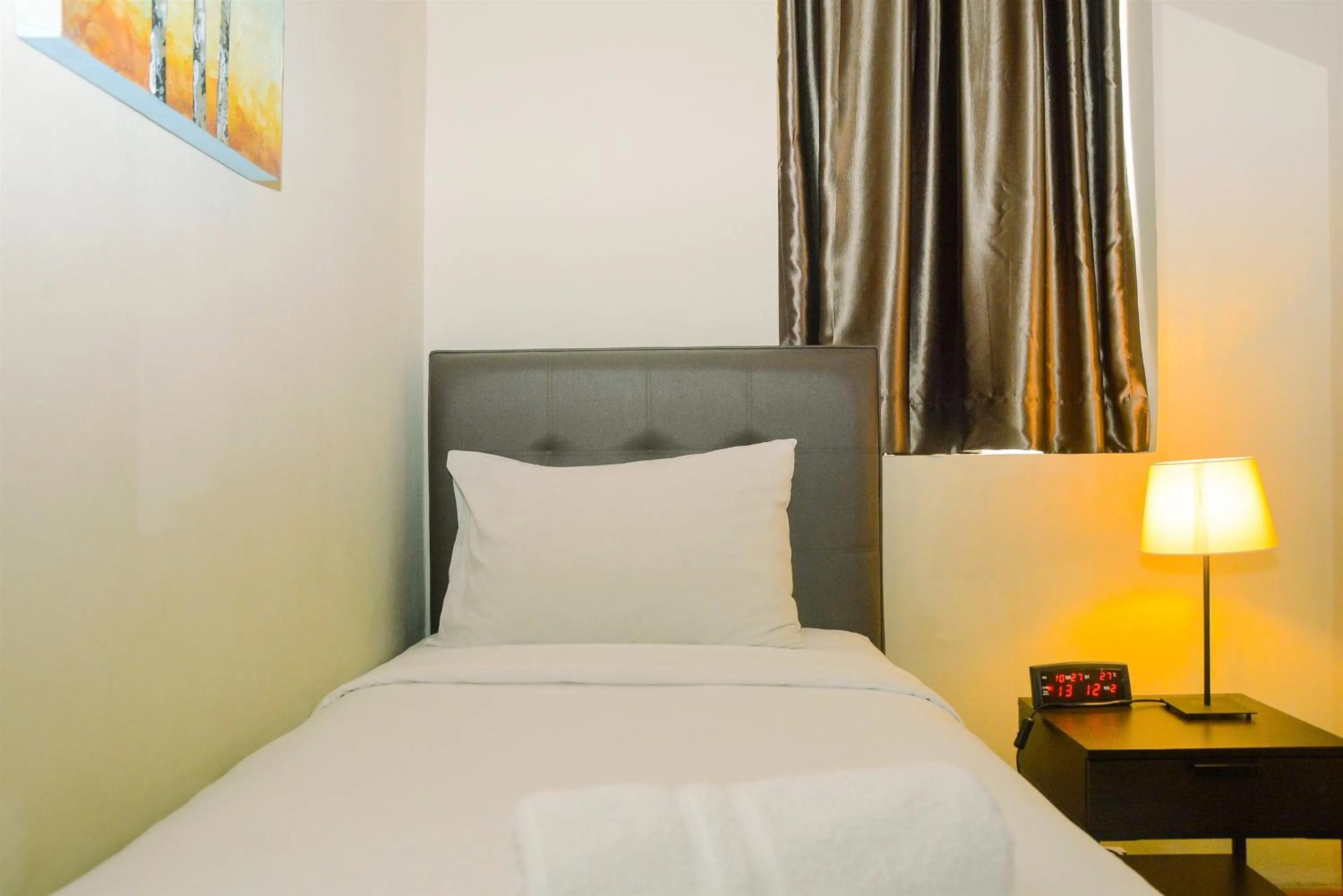 Bed in 3BR Business Residence at Grand Palace Kemayoran Apartment By Travelio