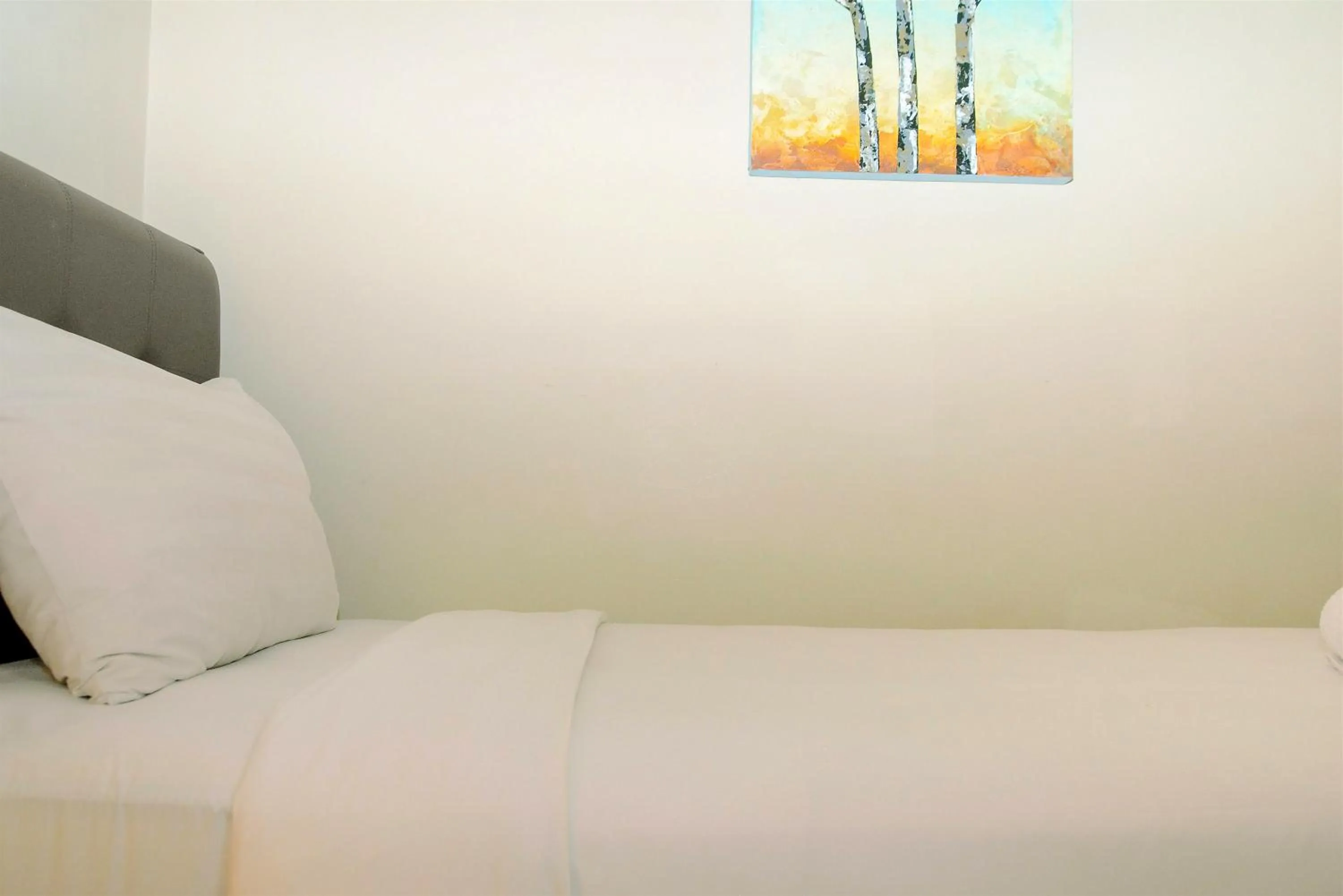 Bed in 3BR Business Residence at Grand Palace Kemayoran Apartment By Travelio