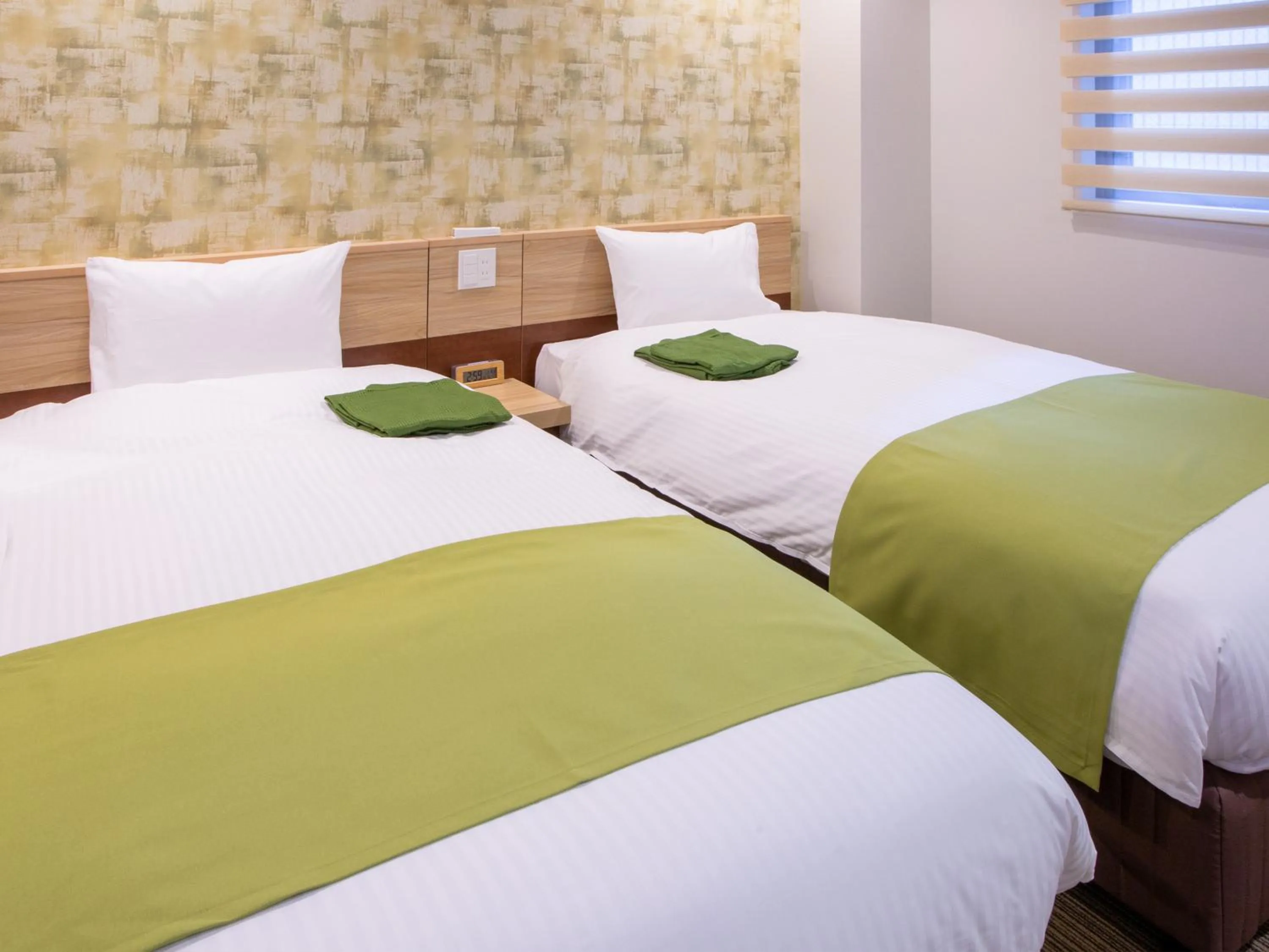 Bed in Kuretake Inn Ogaki Ekimae