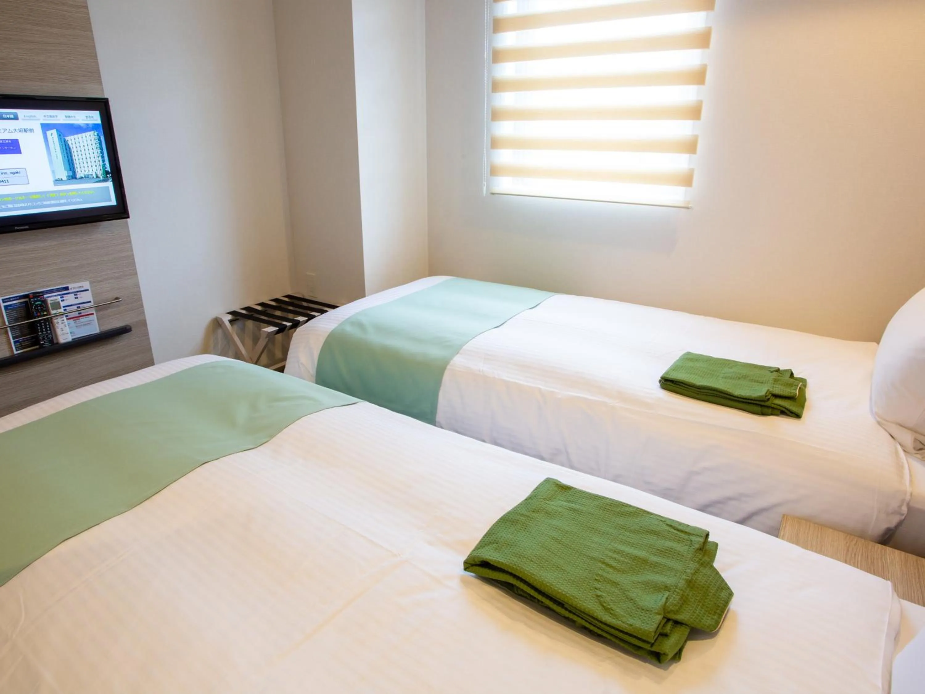 Bed in Kuretake Inn Ogaki Ekimae