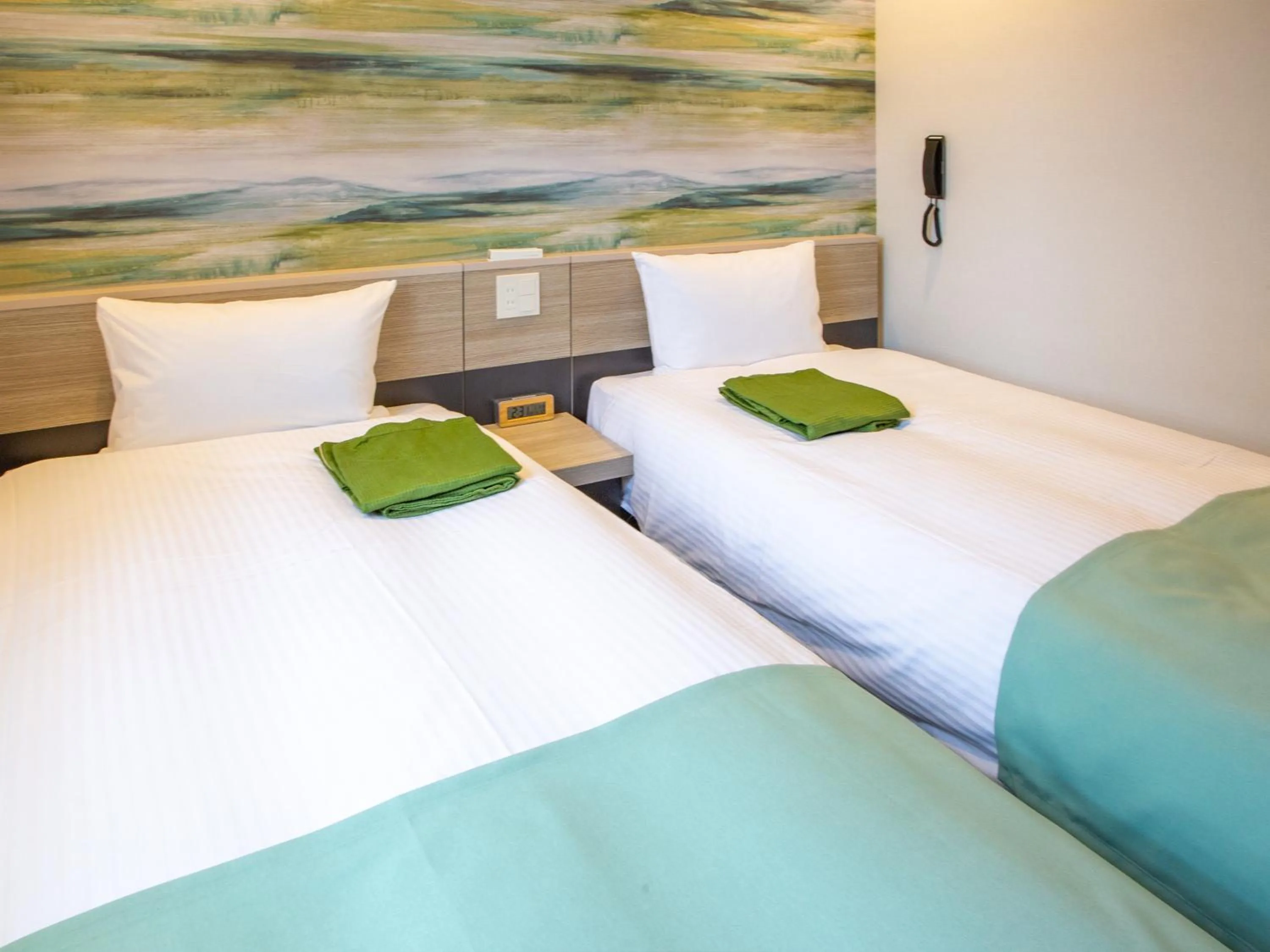 Bed in Kuretake Inn Ogaki Ekimae