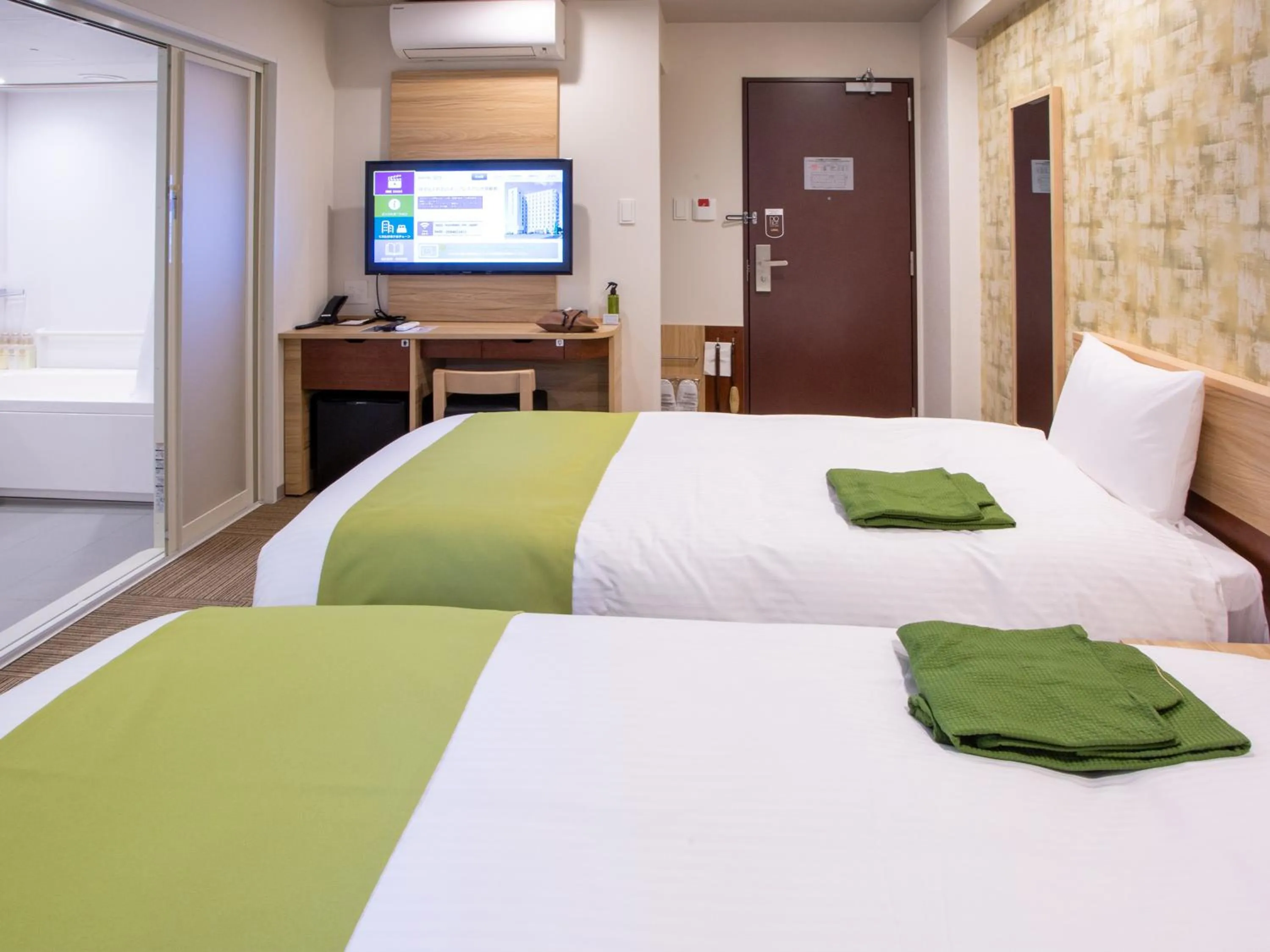 Bed in Kuretake Inn Ogaki Ekimae