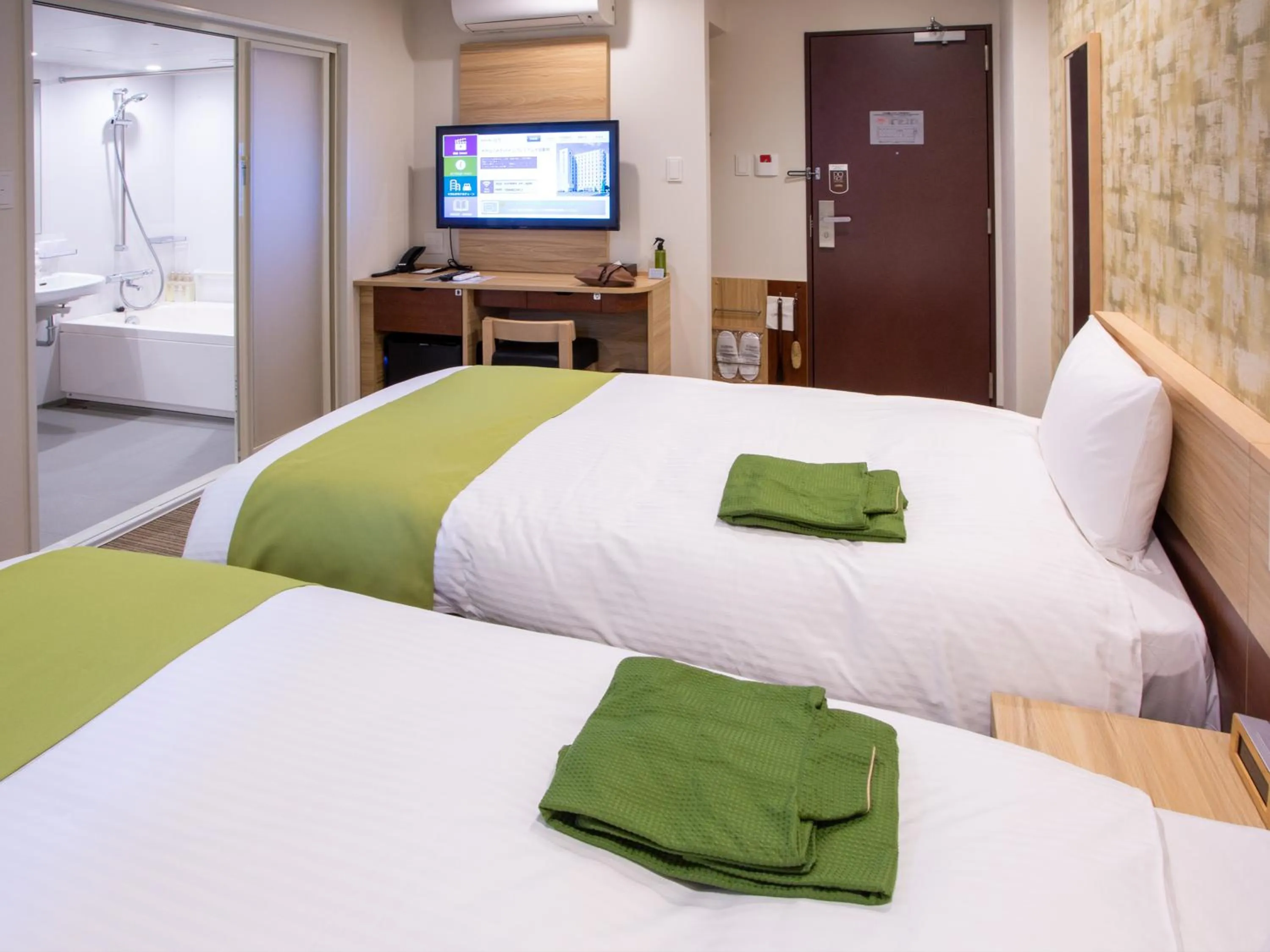 Bed in Kuretake Inn Ogaki Ekimae