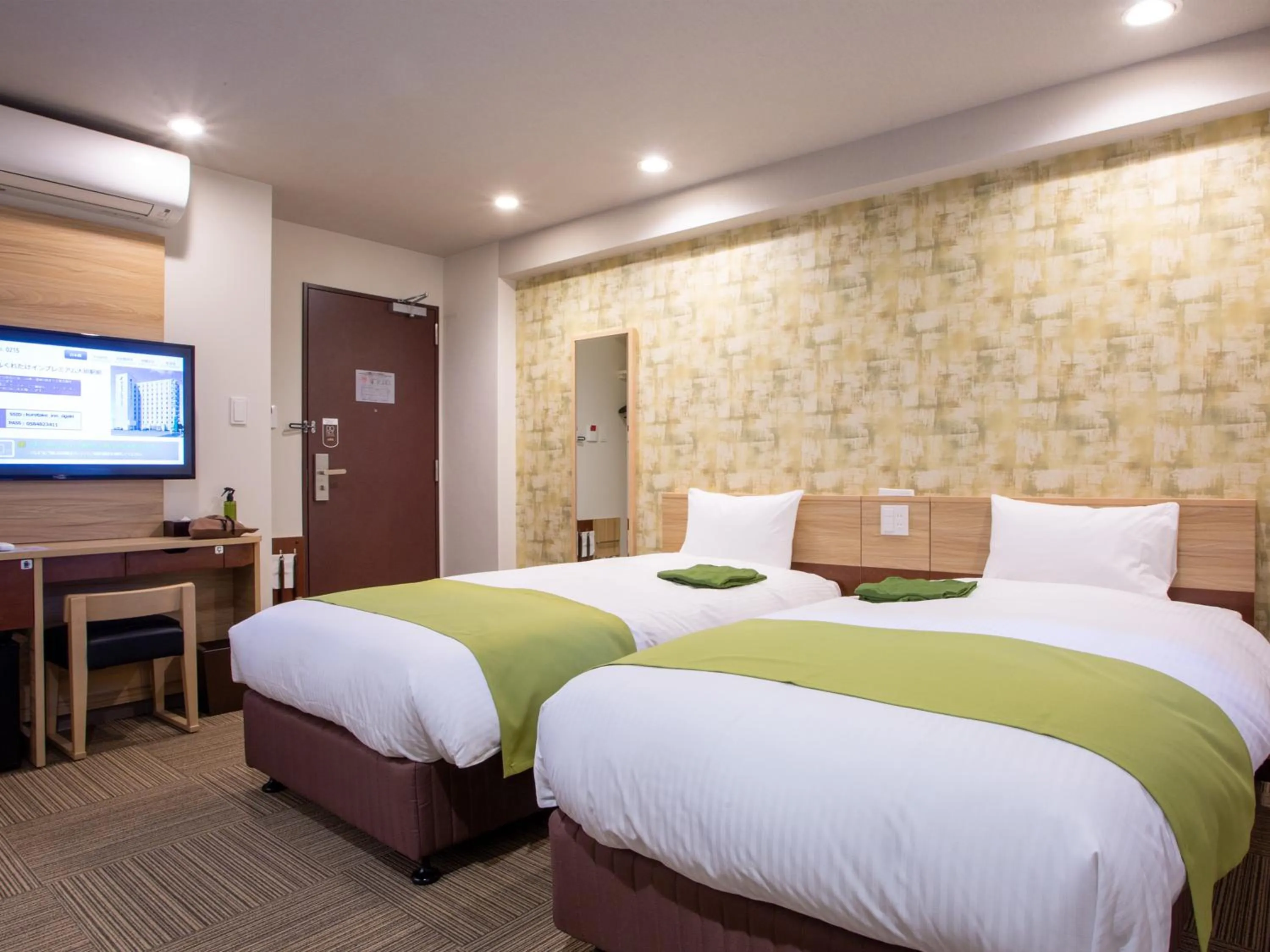 Bed in Kuretake Inn Ogaki Ekimae