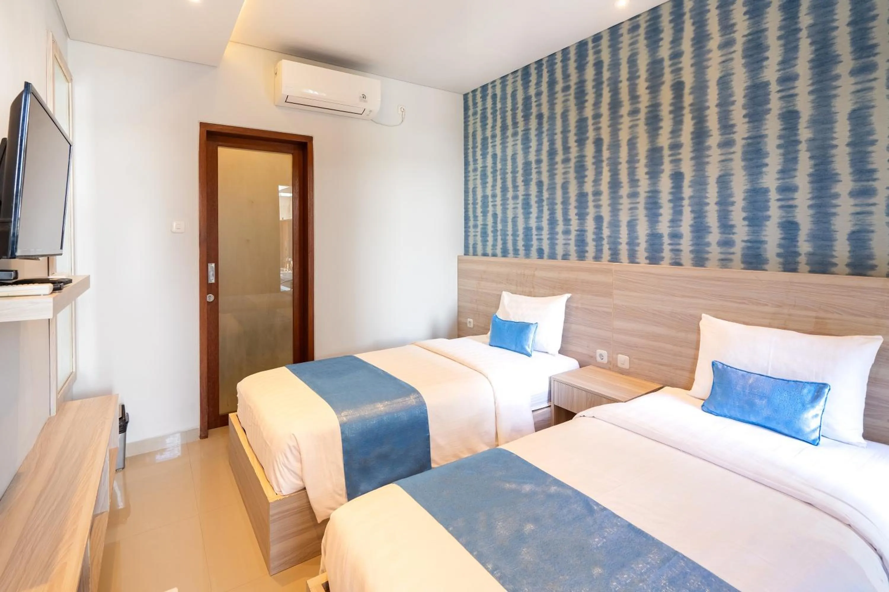 Bed in Mahesa Suites Seminyak