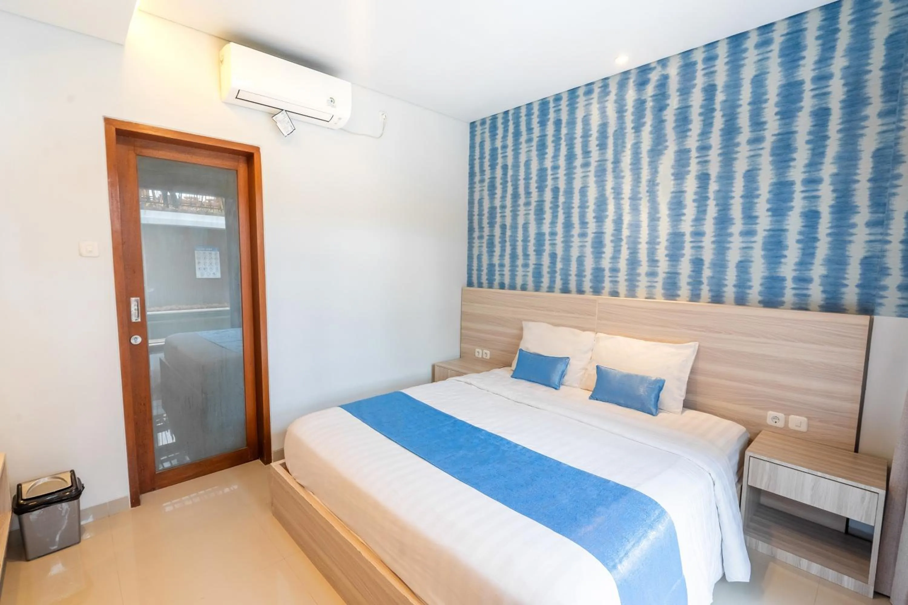 Bed in Mahesa Suites Seminyak