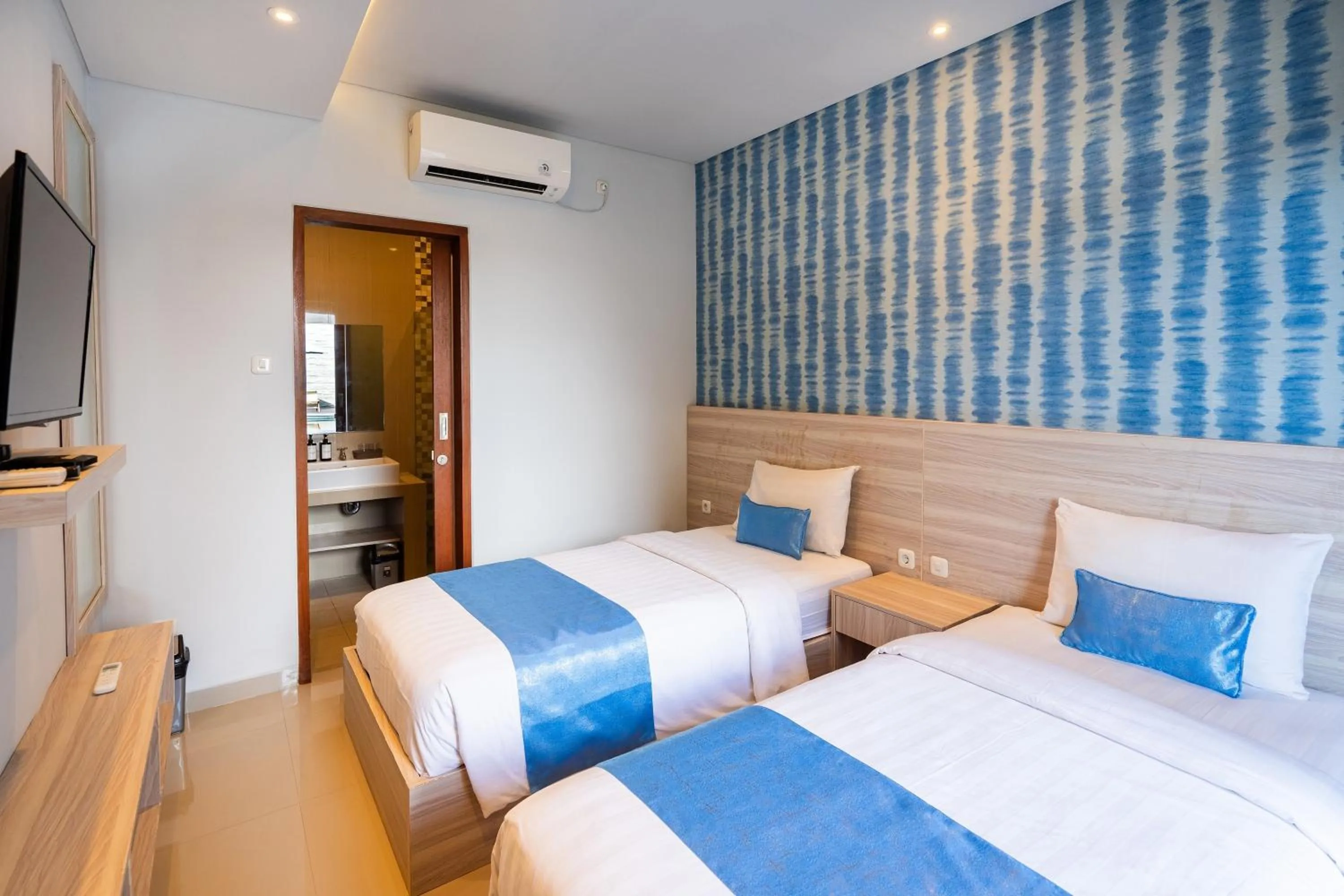 Bed in Mahesa Suites Seminyak