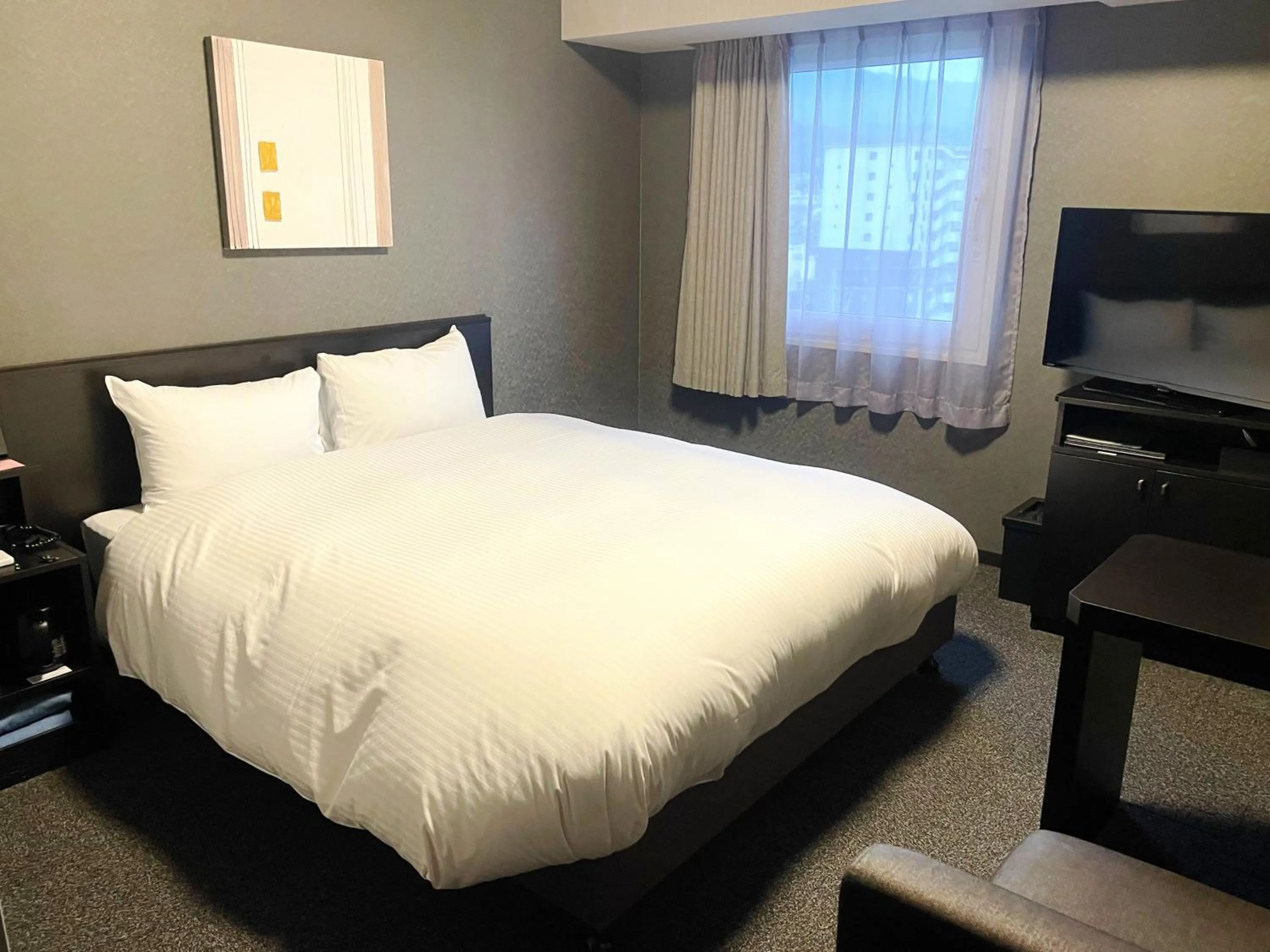 Photo of the whole room, Bed in Hotel Route-Inn Sakurai Ekimae
