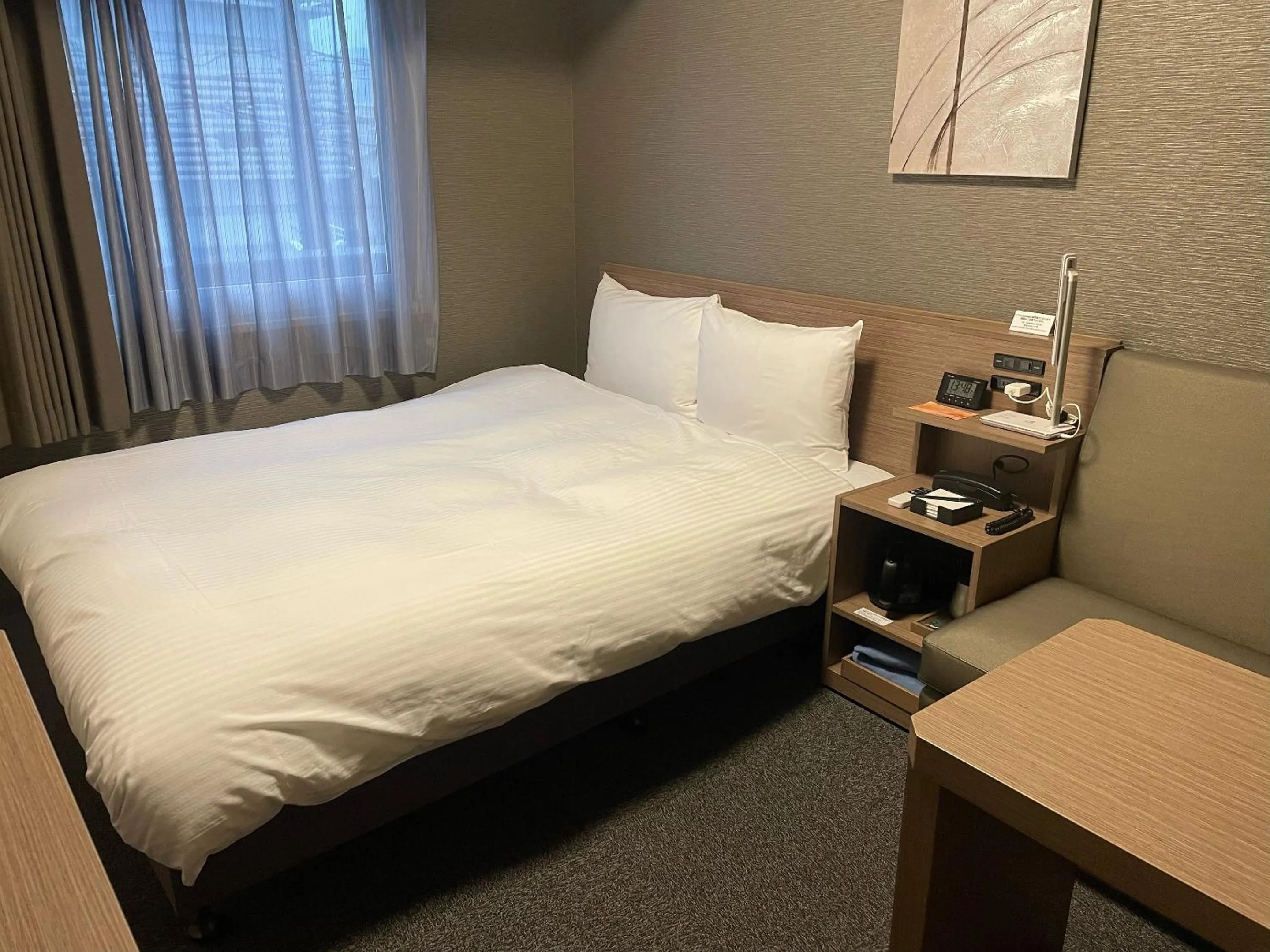 Photo of the whole room, Bed in Hotel Route-Inn Sakurai Ekimae