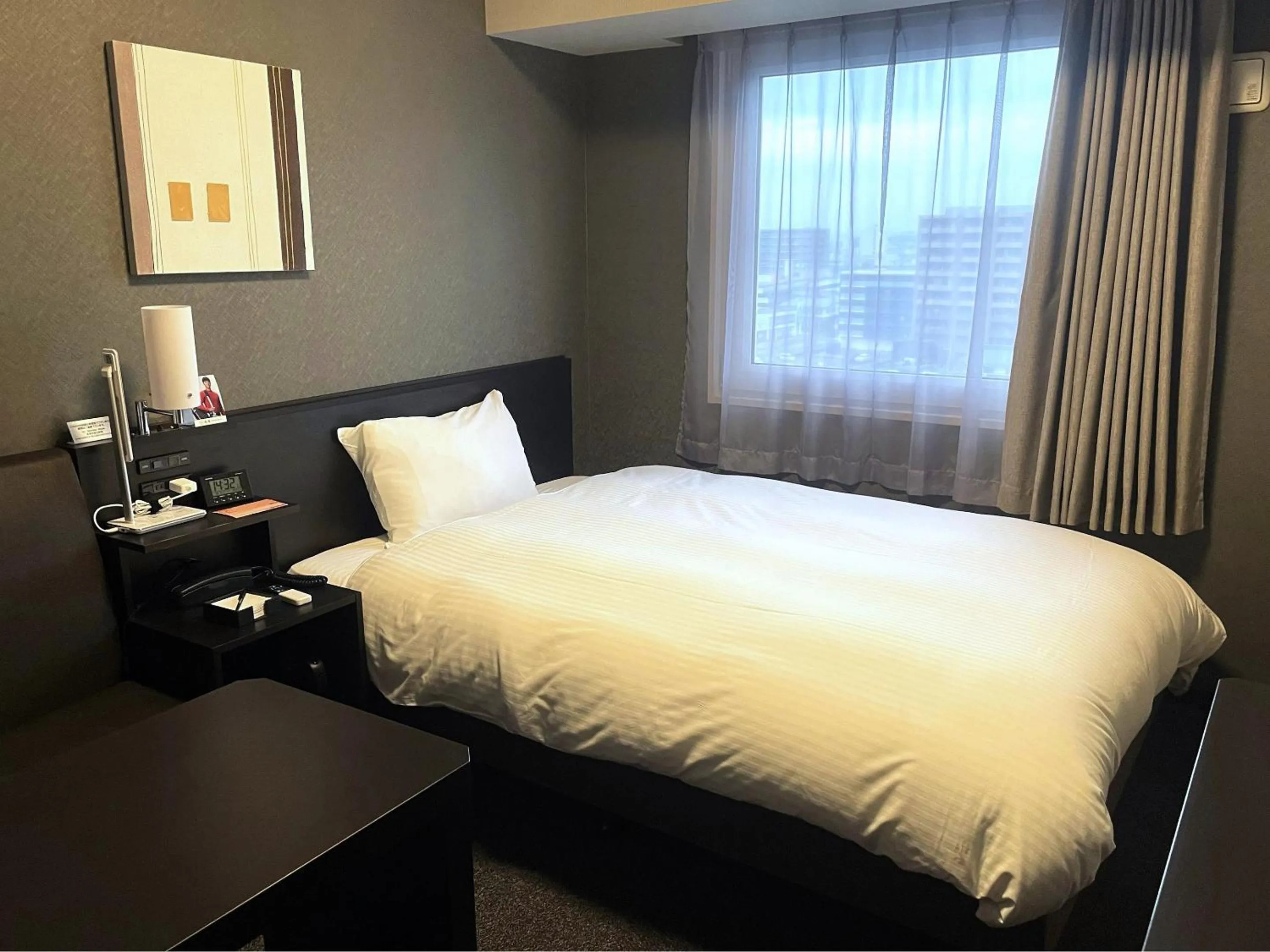 Photo of the whole room, Bed in Hotel Route-Inn Sakurai Ekimae