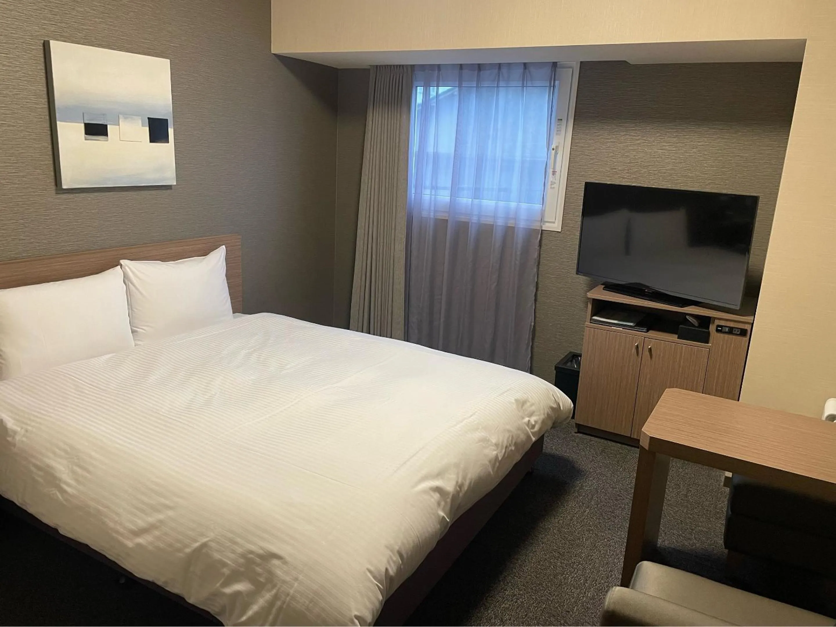Photo of the whole room, Bed in Hotel Route-Inn Sakurai Ekimae