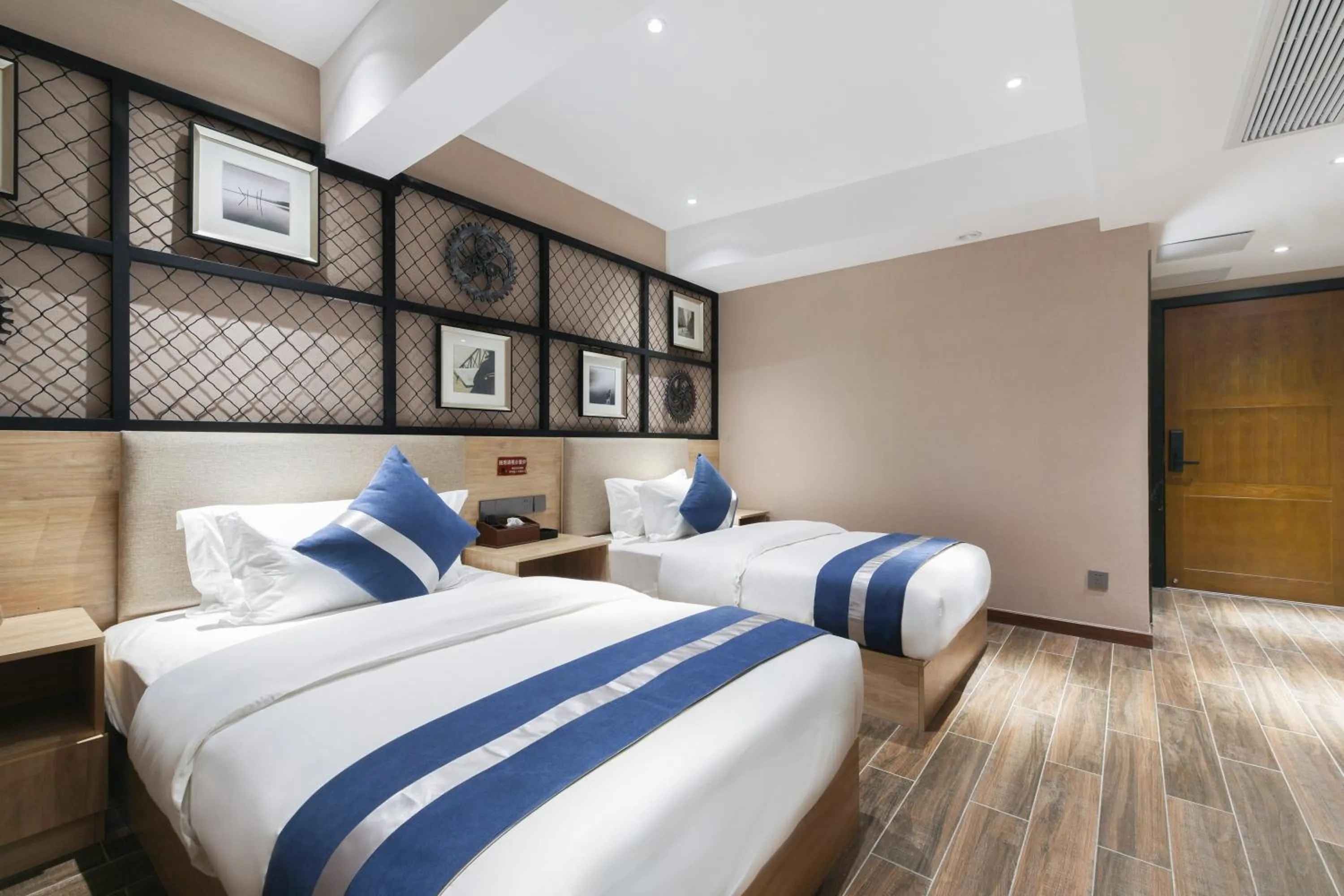 Bed in Zou Qu Ye Travel Hotel