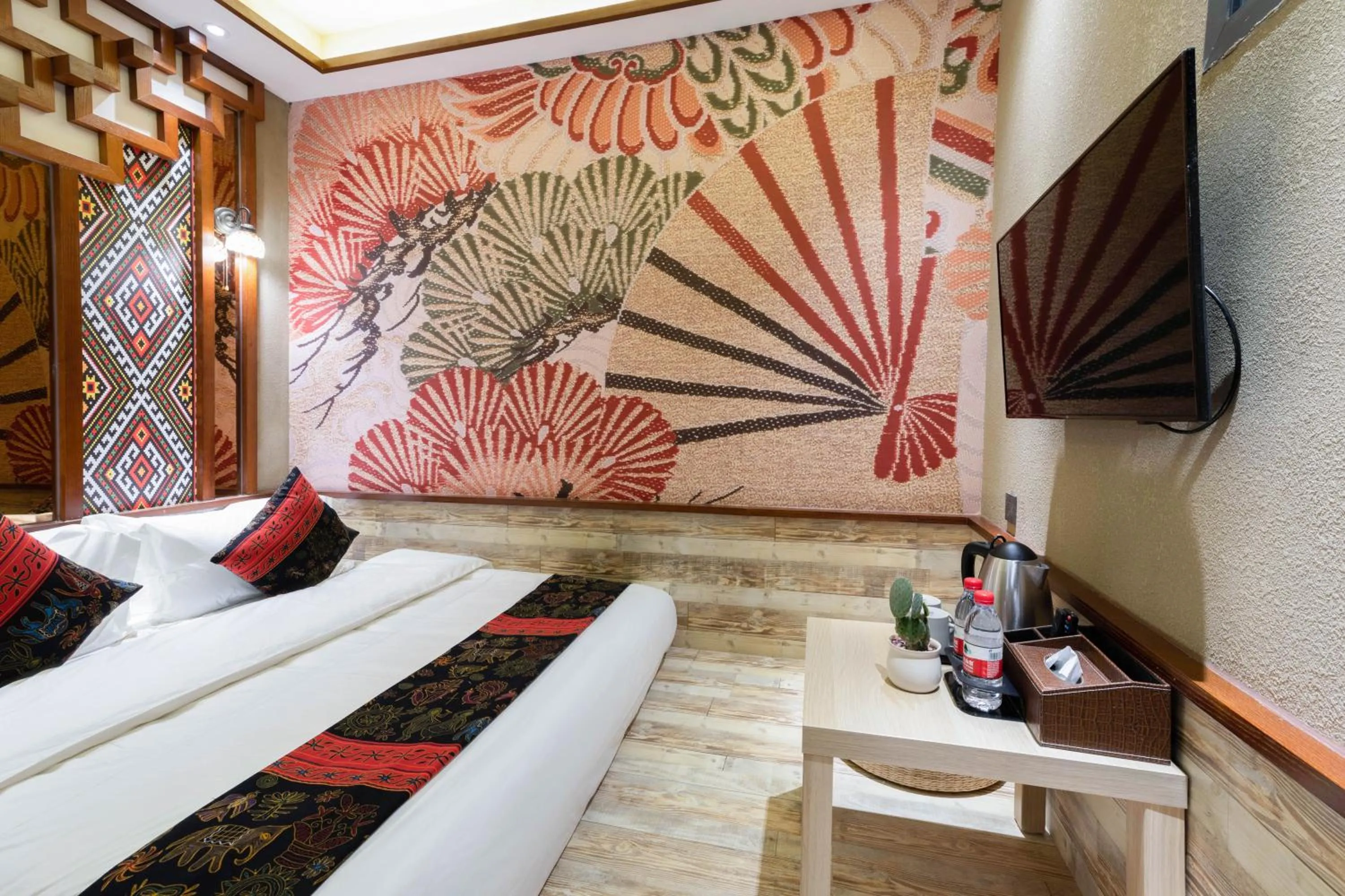 Bed in Zou Qu Ye Travel Hotel