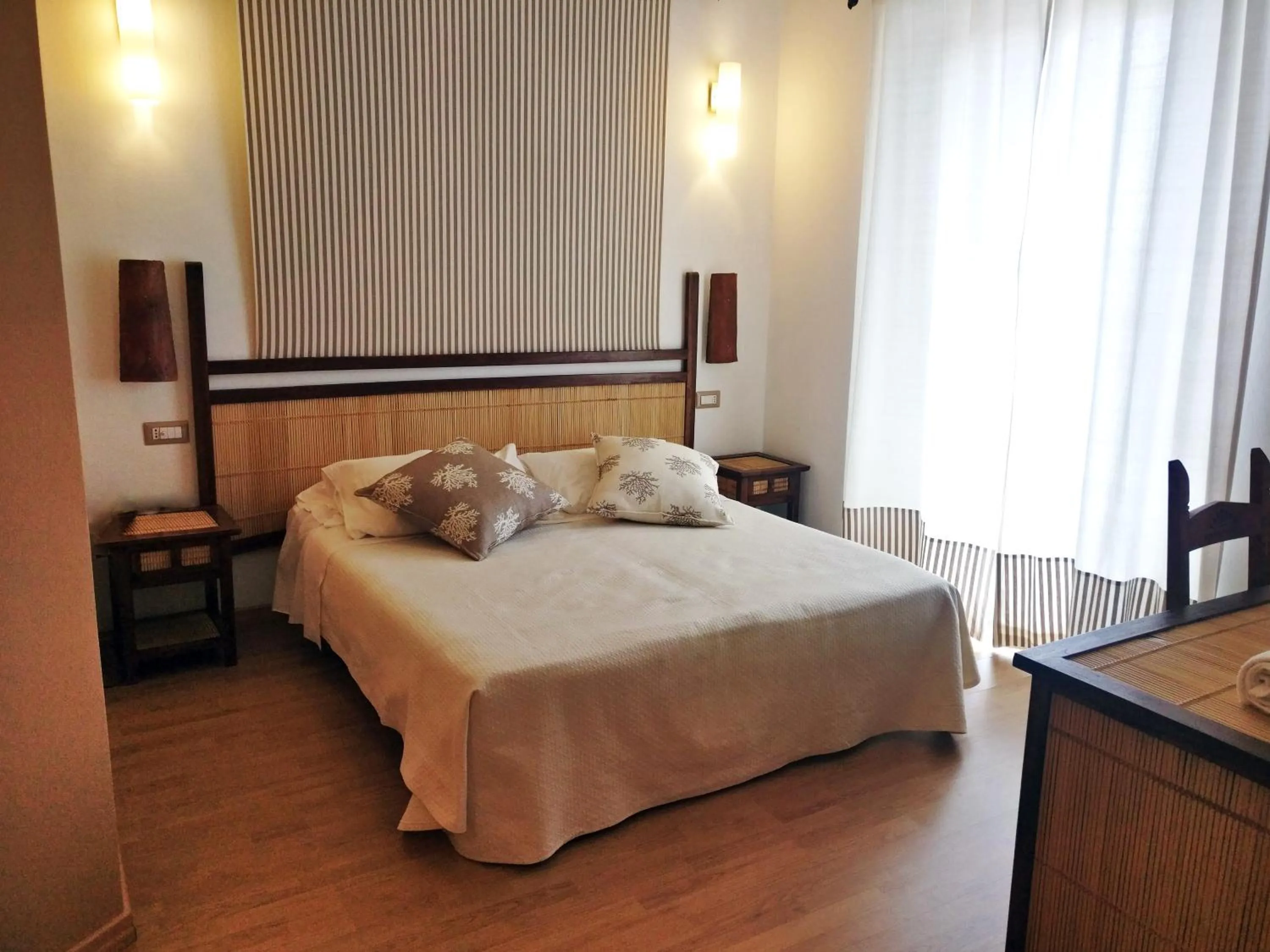 Bed in Hotel Da Cecco