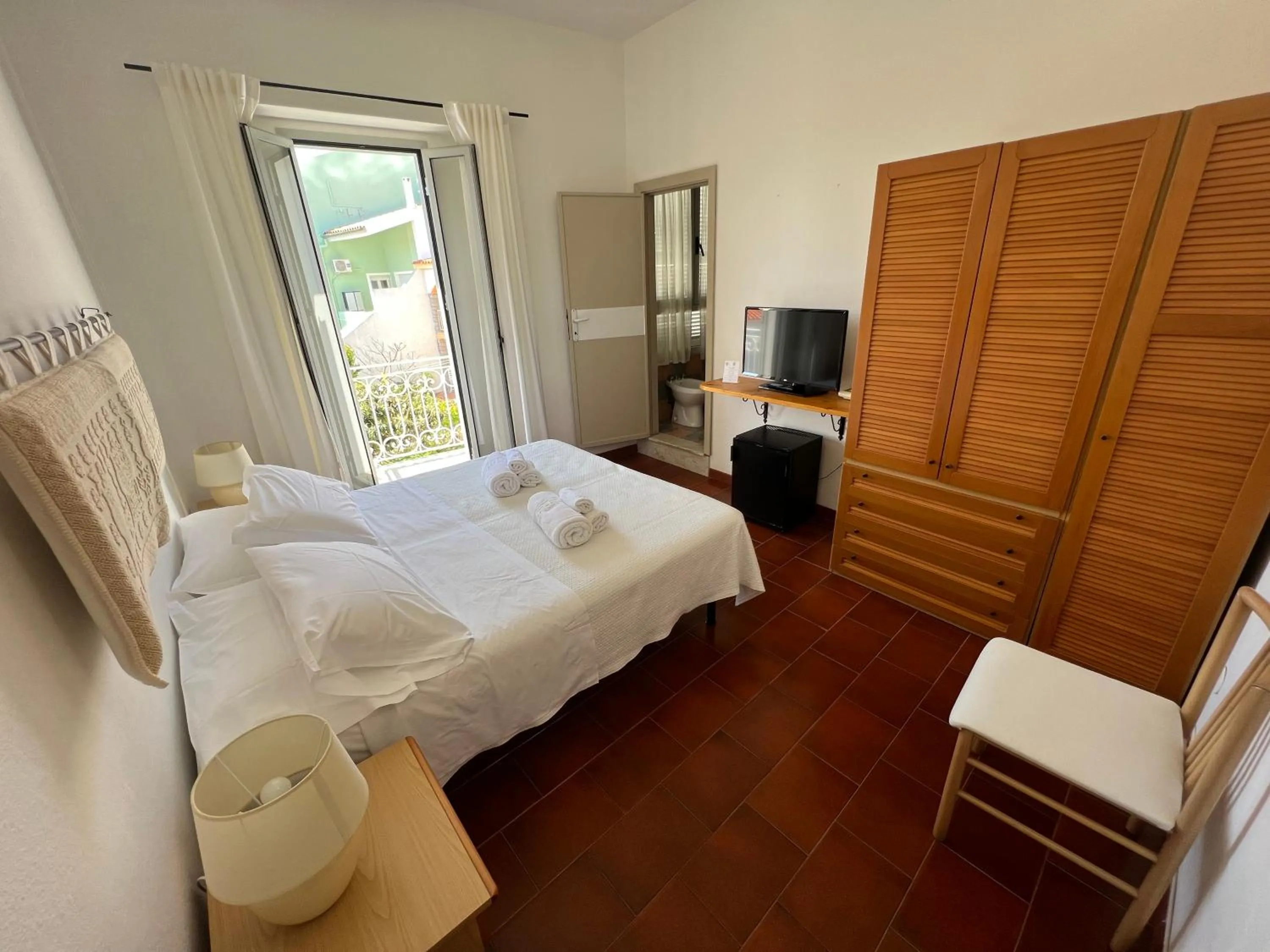 Bed in Hotel Da Cecco