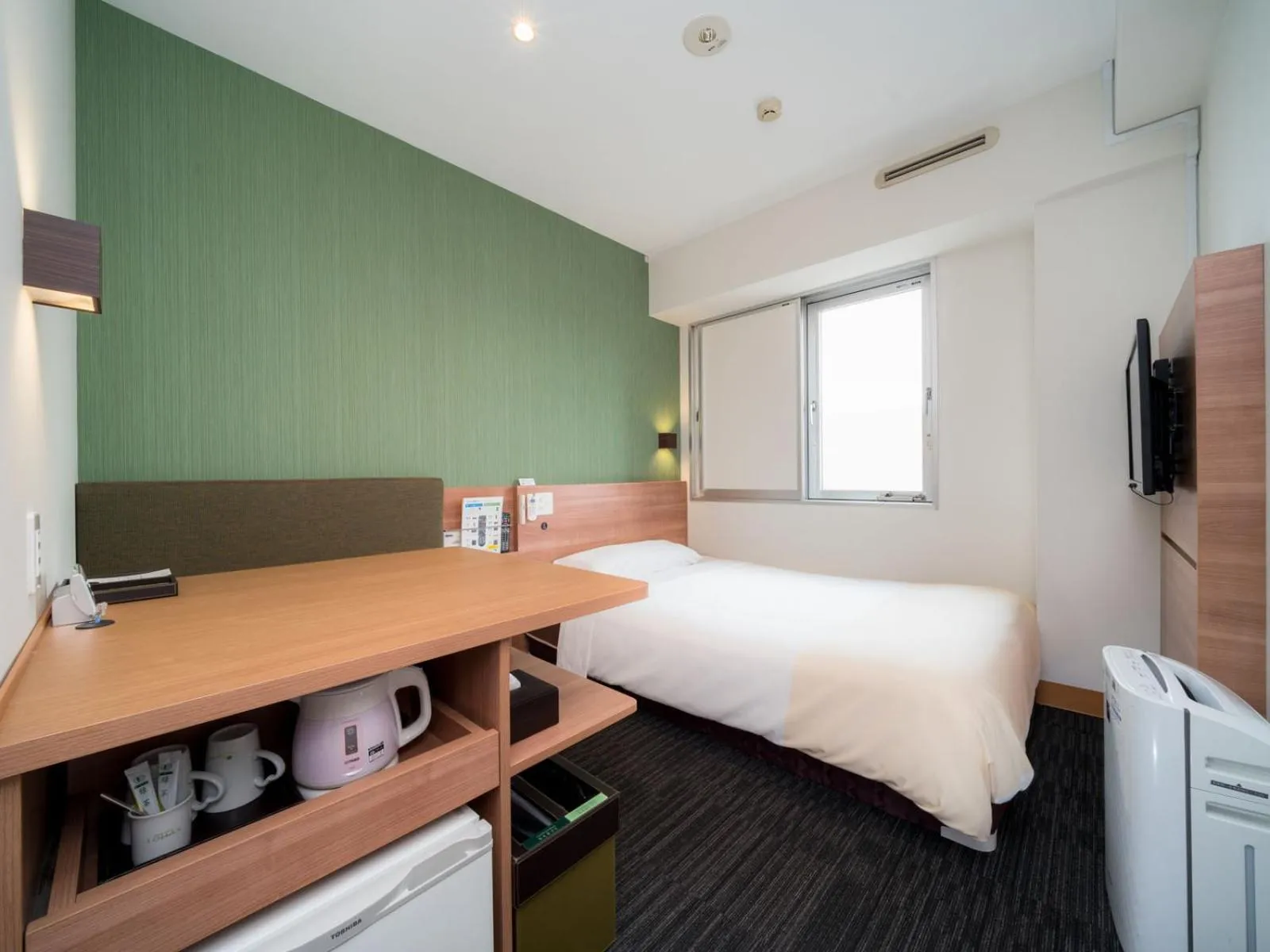 Bed in Super Hotel Nagoya Ekimae