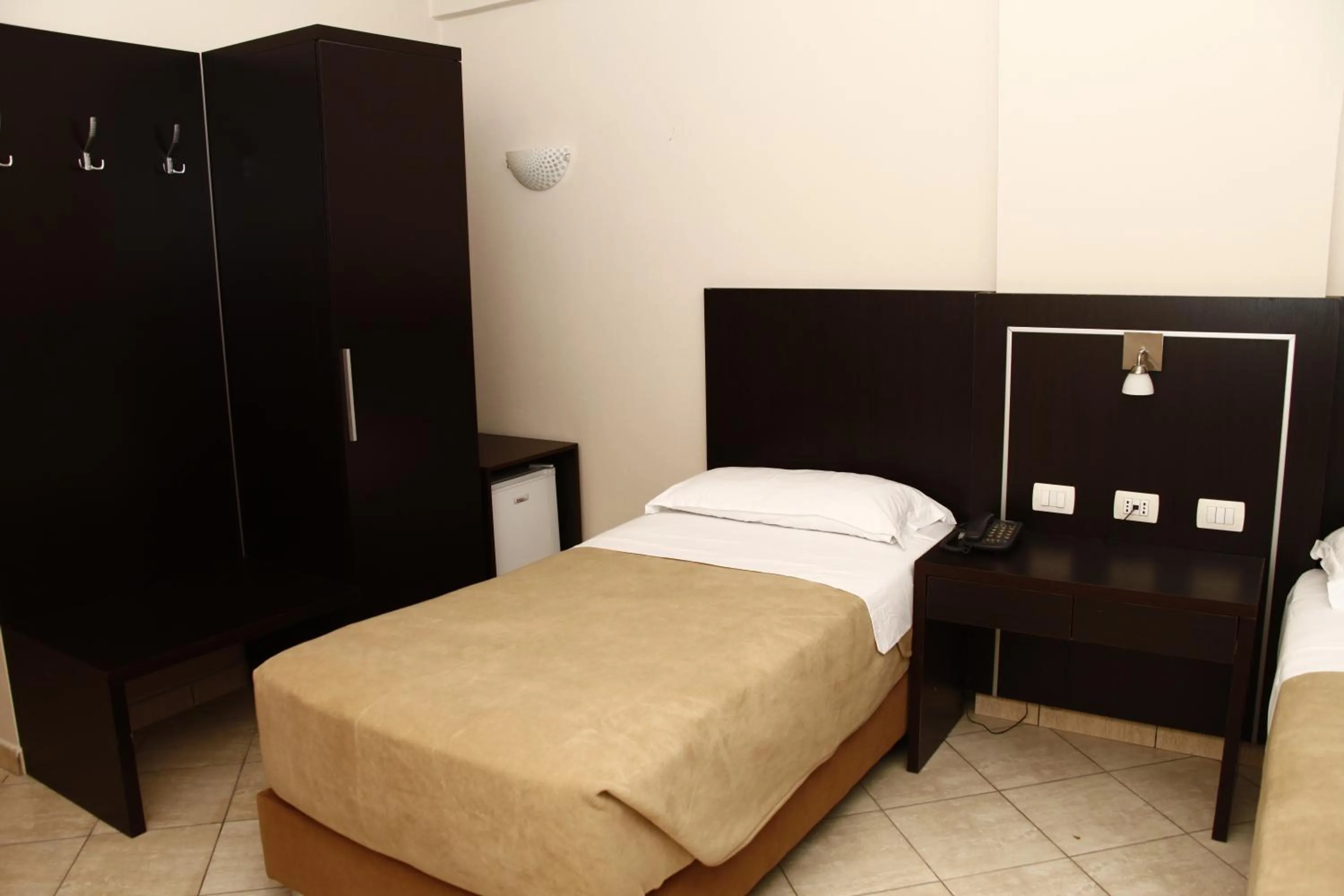 Bed in Hotel Nais Beach