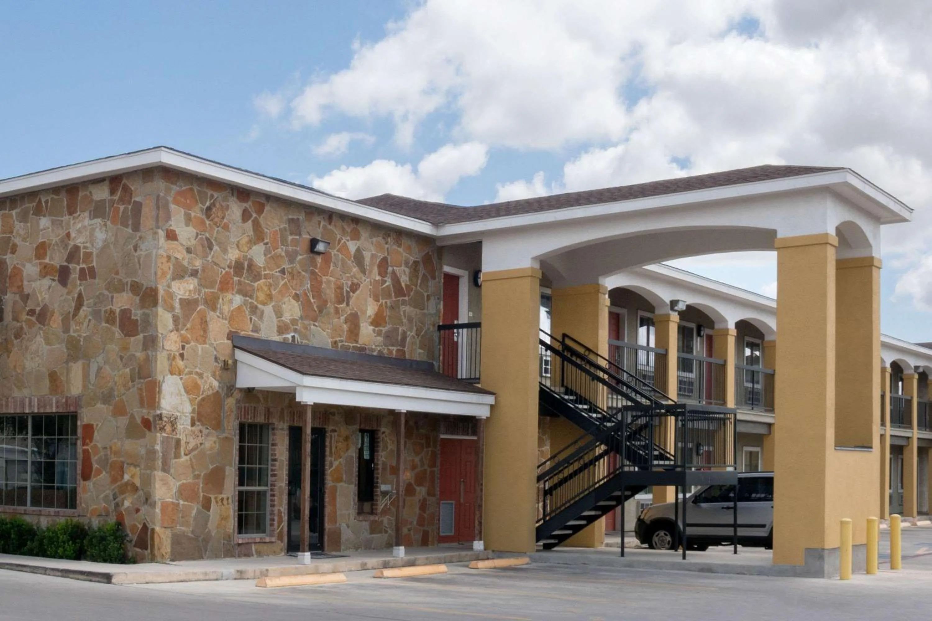 Property building in Super 8 by Wyndham San Antonio Near Fort Sam Houston