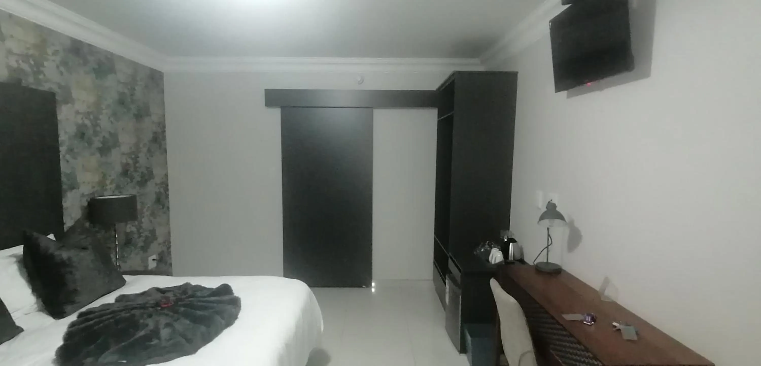 Bed in Prisatt Boutique Hotel