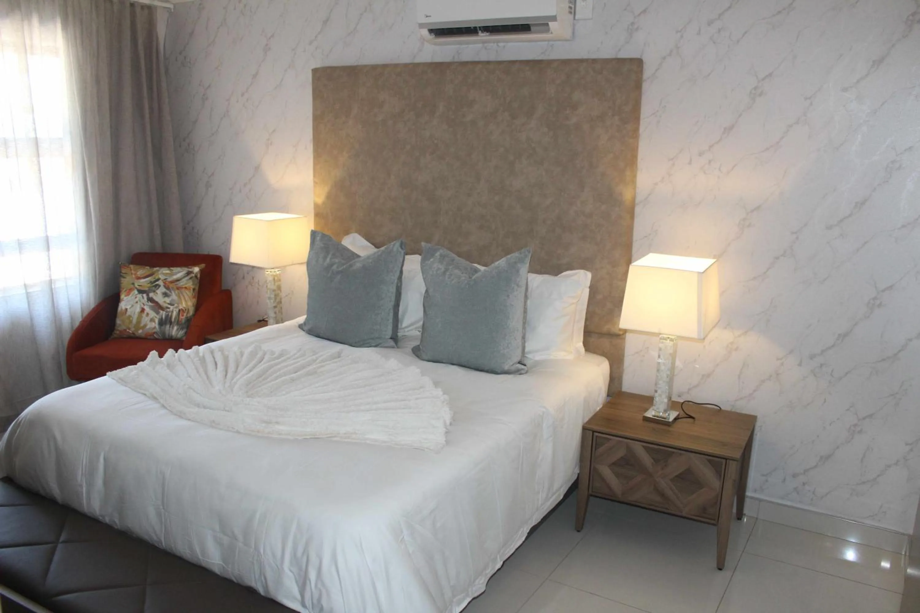 Bed in Prisatt Boutique Hotel